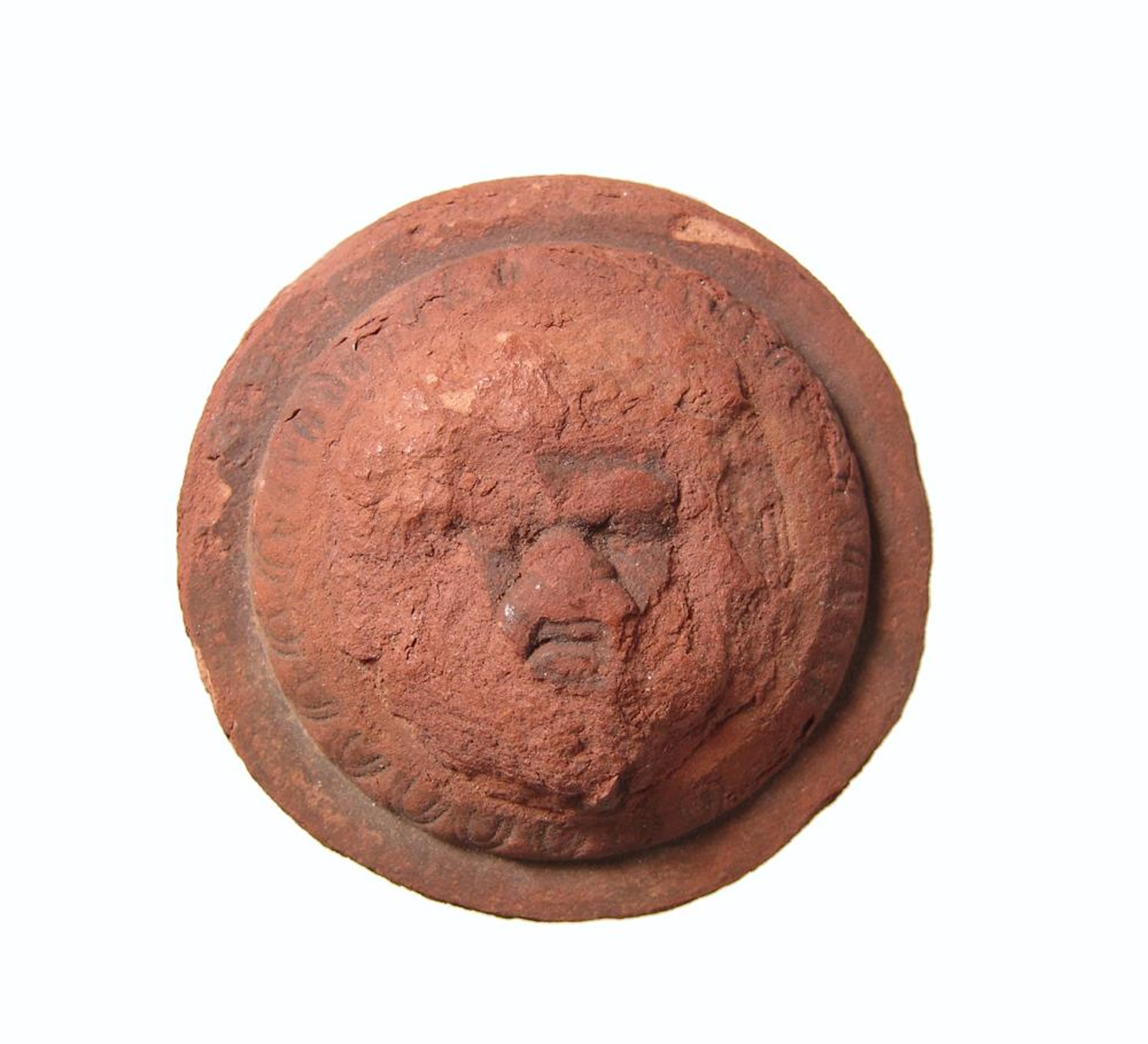 Roman-Egyptian terracotta applique depicting Bes