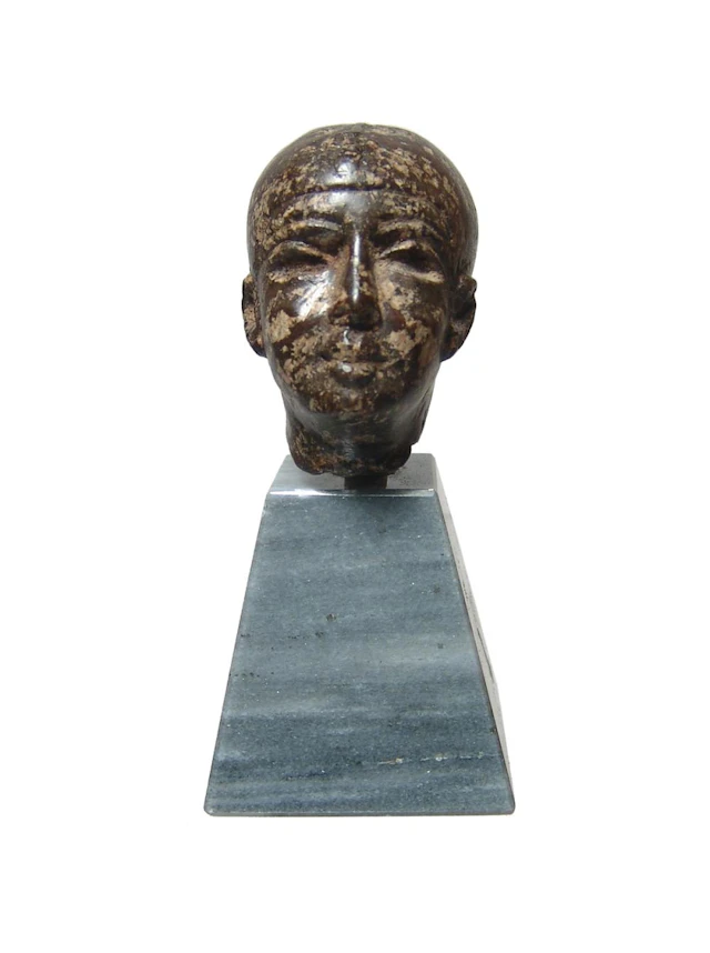 Choice Egyptian porphyry head of a Ptah, Late Period