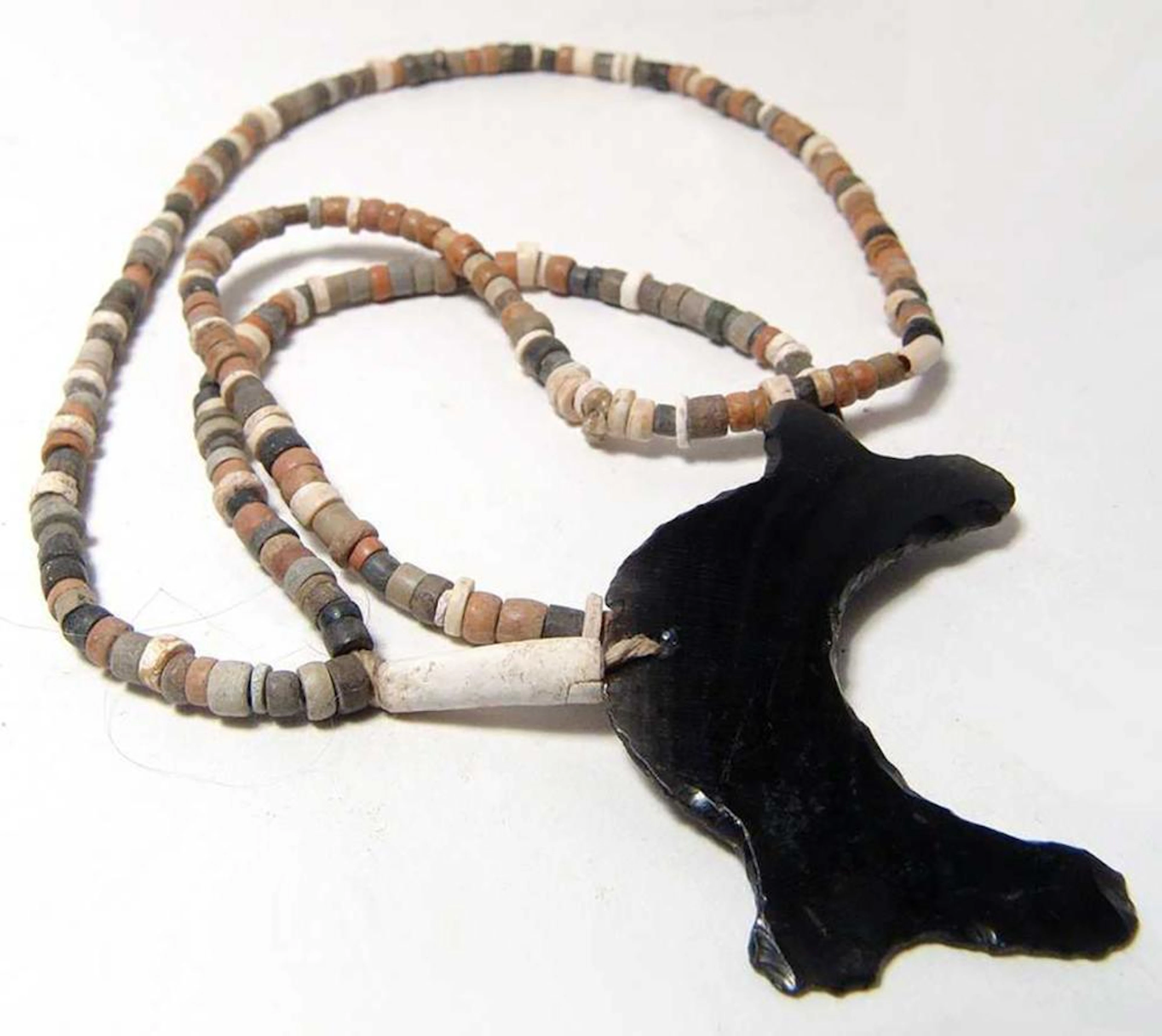 Necklace of Chimu steatite beads with obsidian pendant