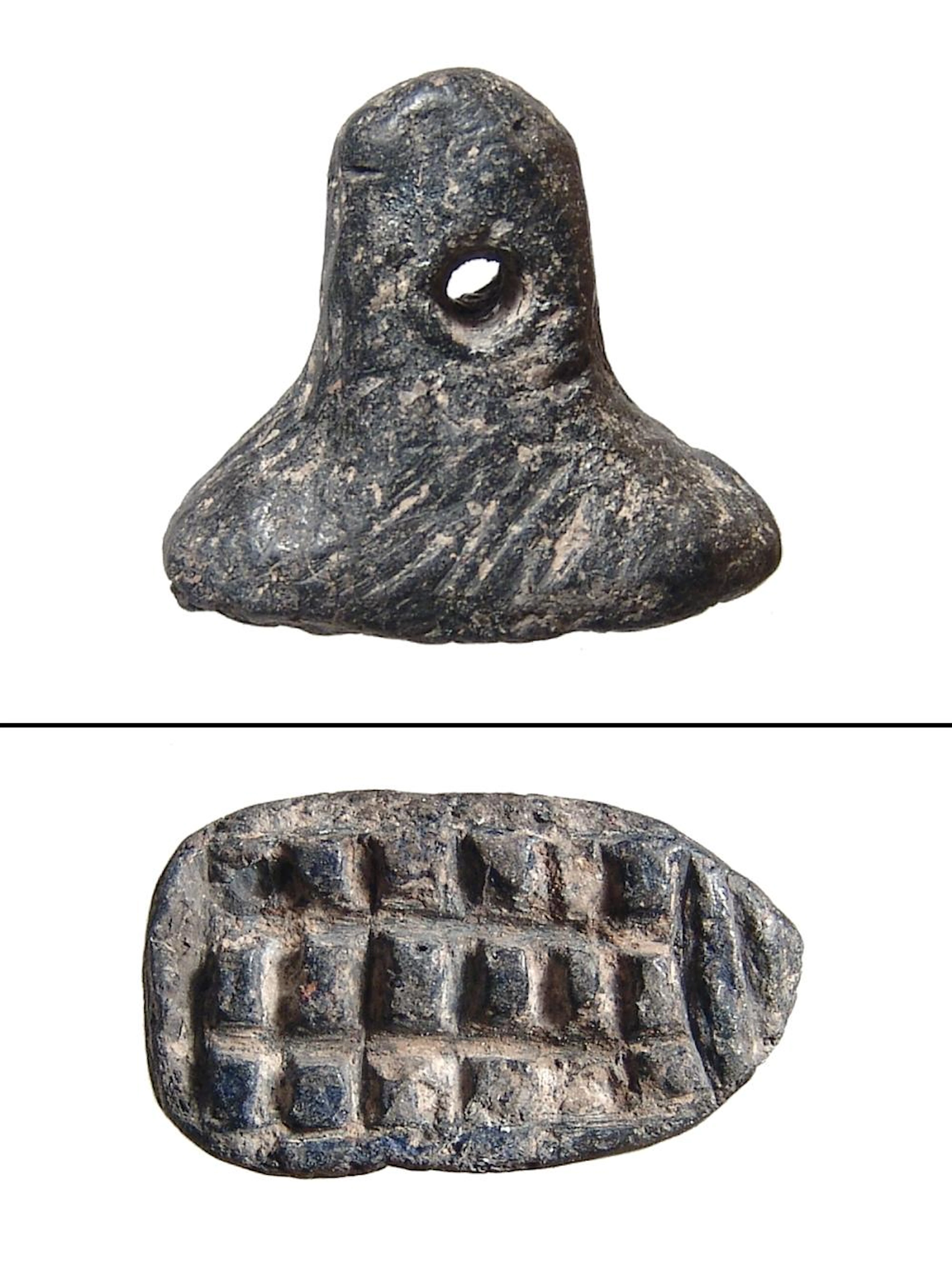 A rare Mesopotamian black ceramic stamp seal