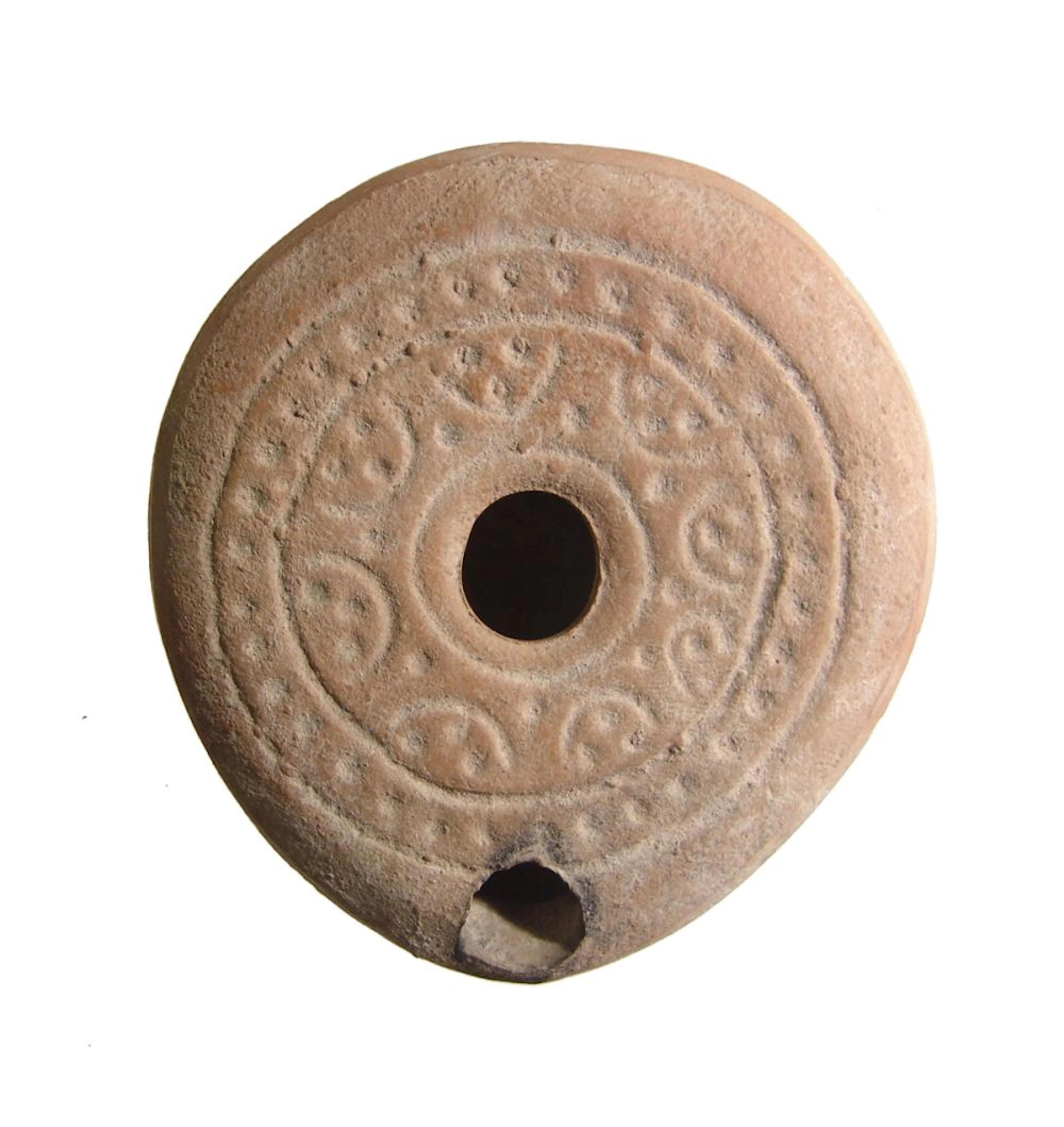 An attractive Byzantine ceramic lamp