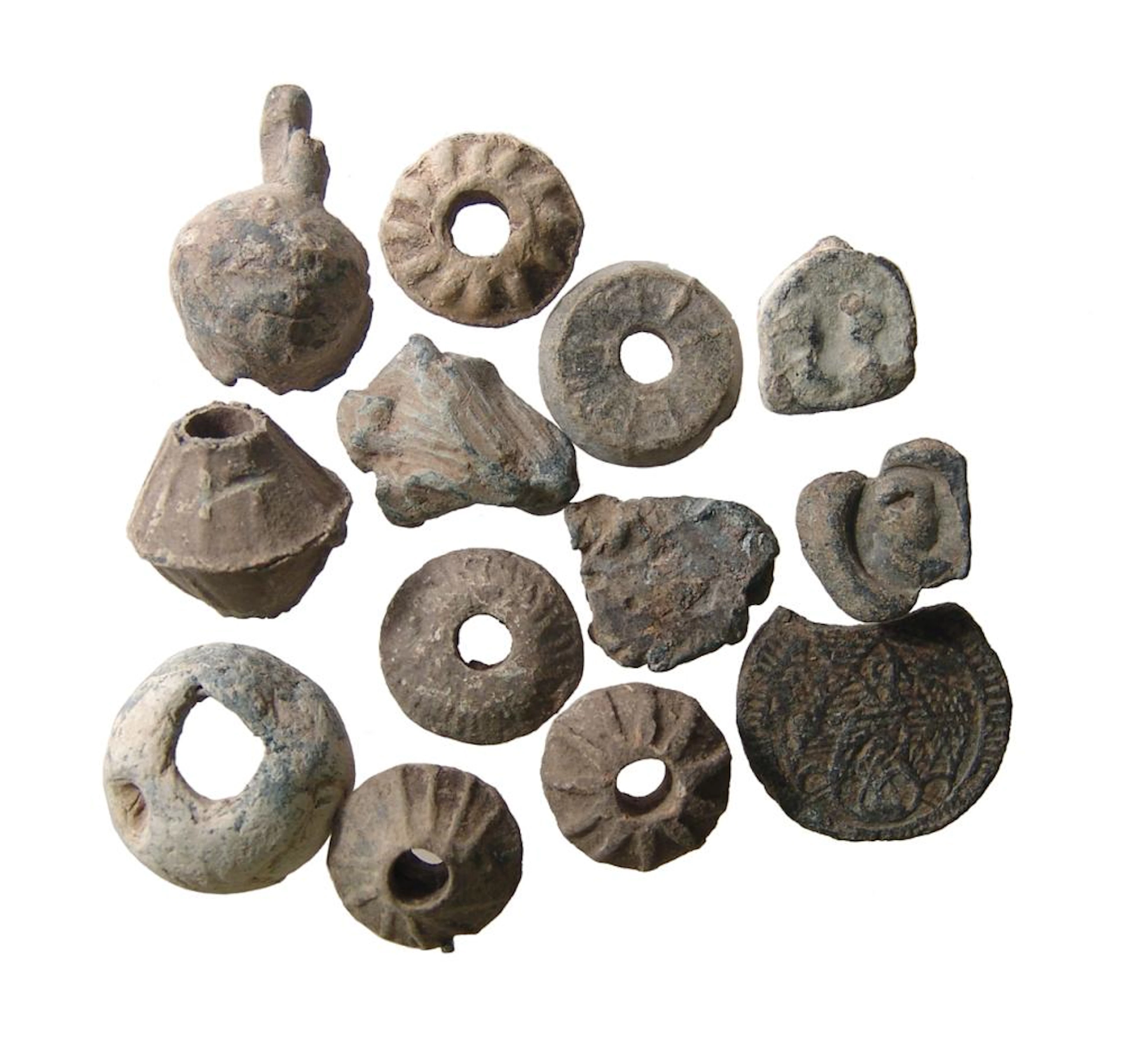 A lot of lead whorls and bullae