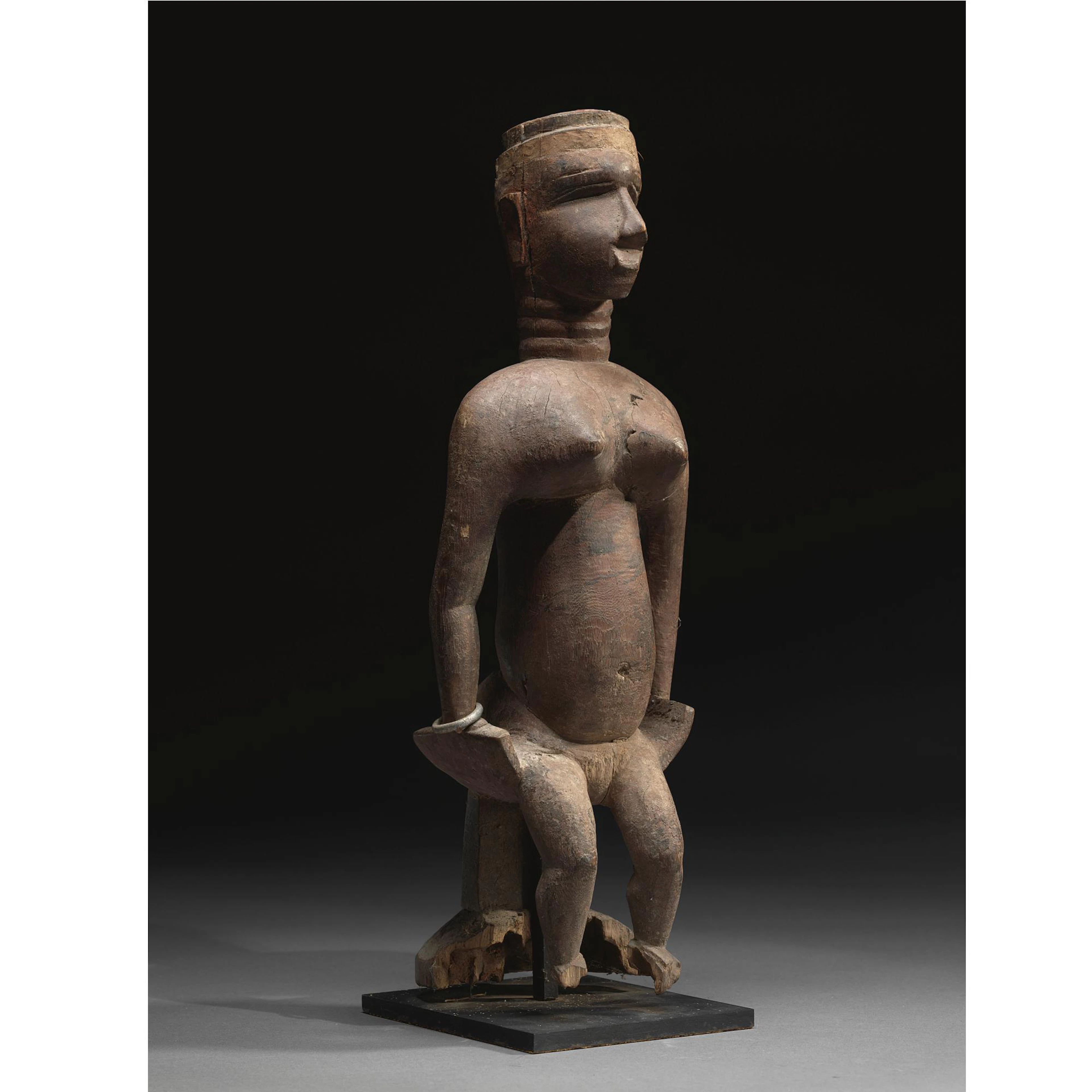 A Bijogo Seated Female Figure, Guinea-Bissau