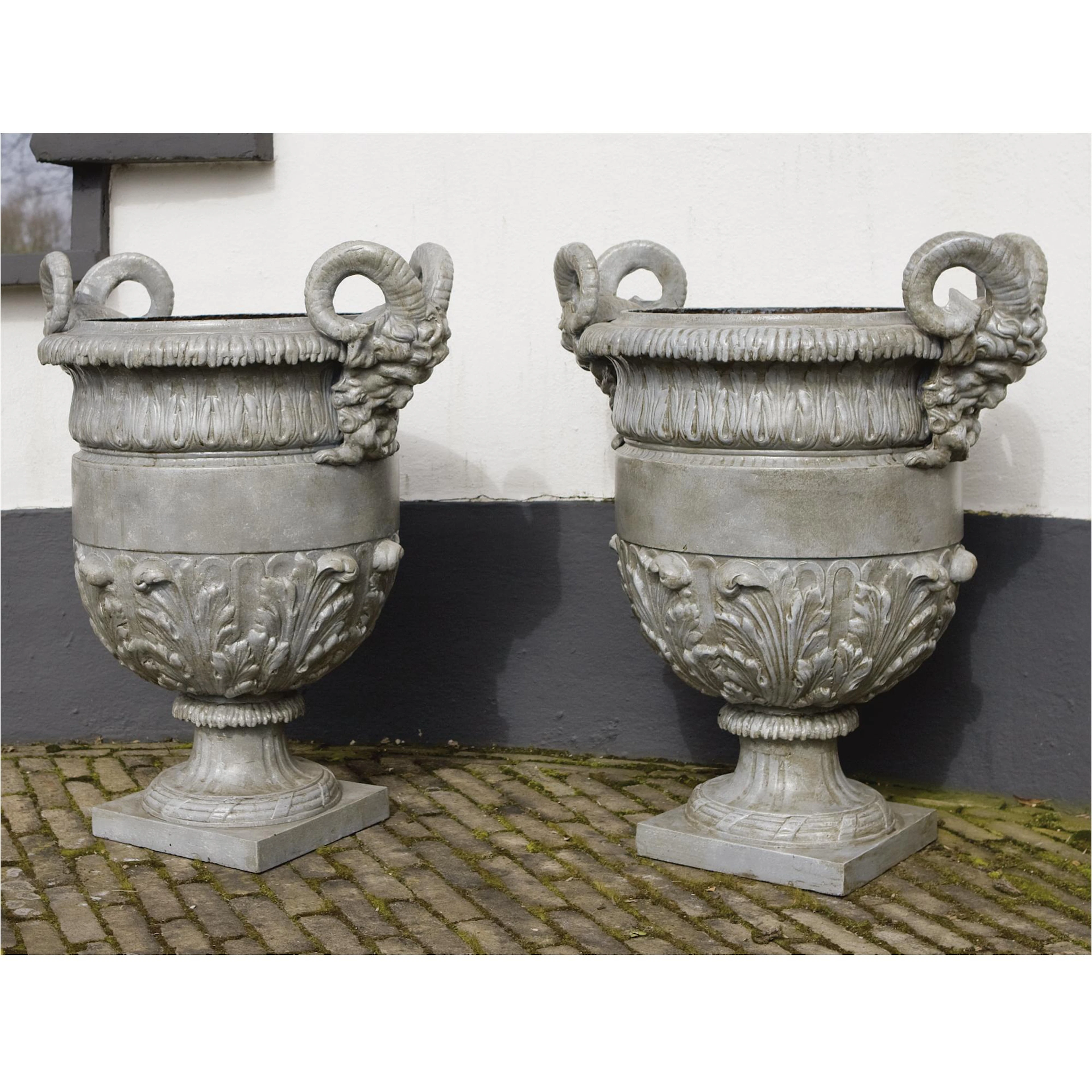 A pair of French cast-iron urns, after Ballin, late 19th century (CI.5)