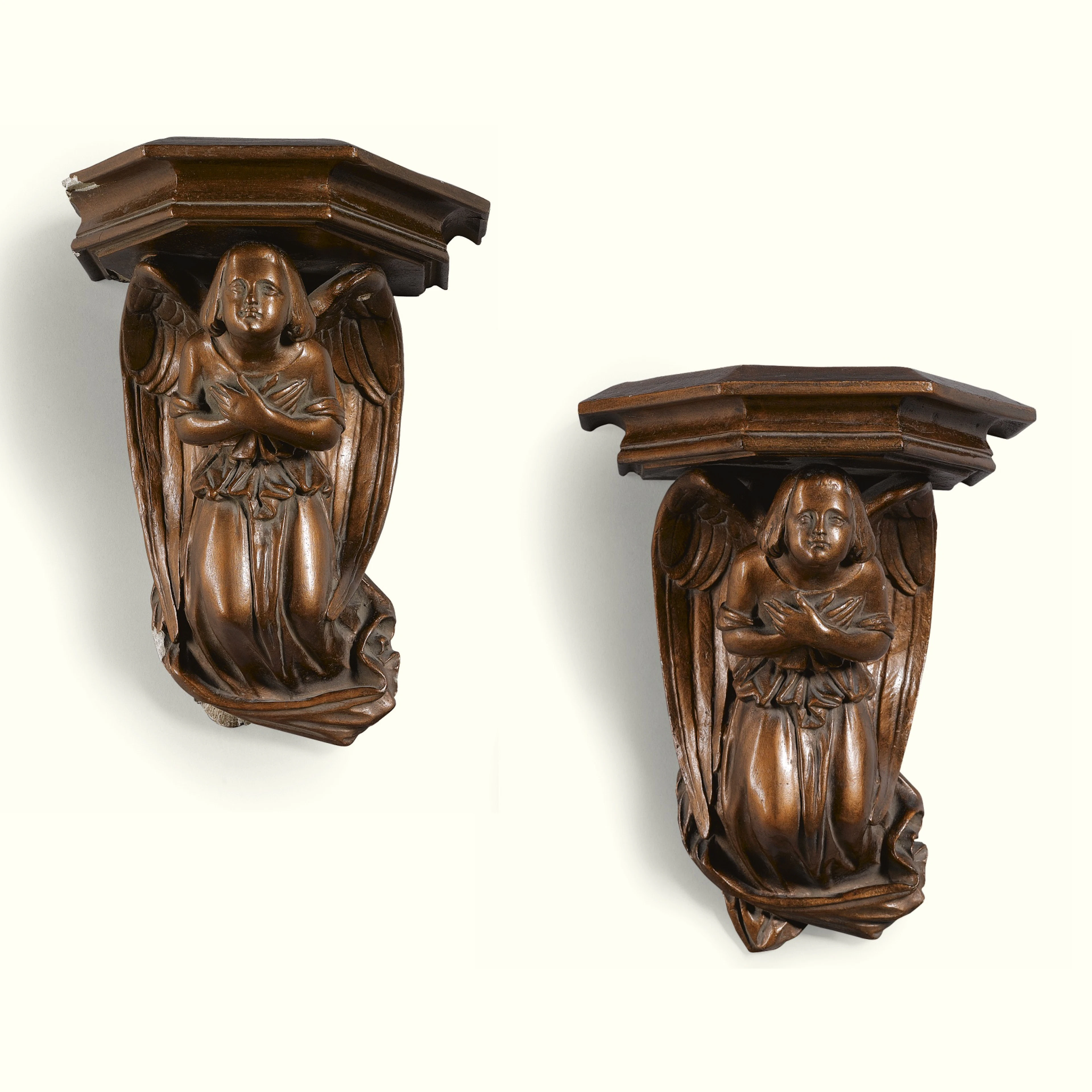 A pair of Louis-Philippe bronzed plaster and papier maché wall brackets by Sussé, circa 1840