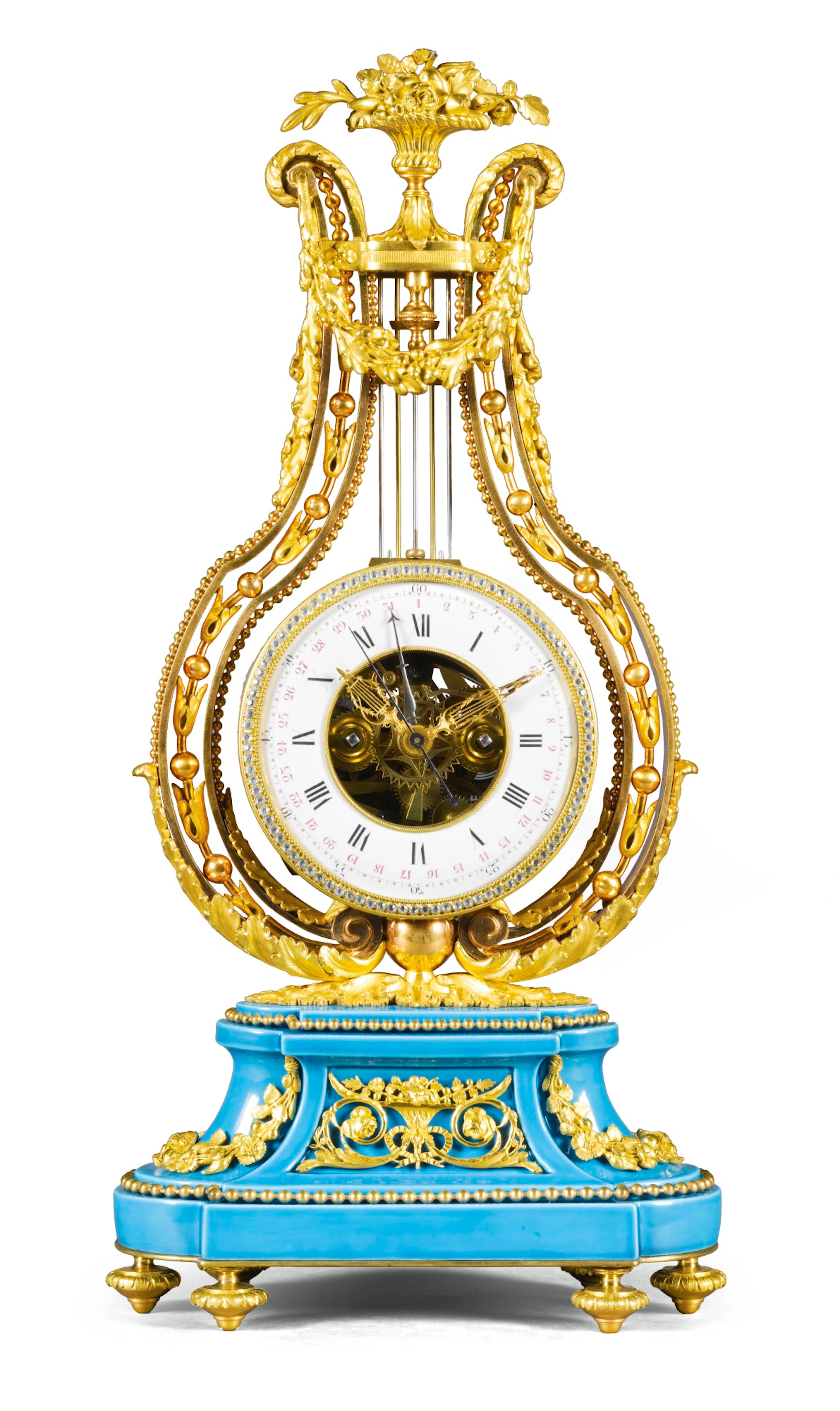 A Louis XVI-style gilt-bronze and porcelain oscillating movement lyre clock, circa 1860