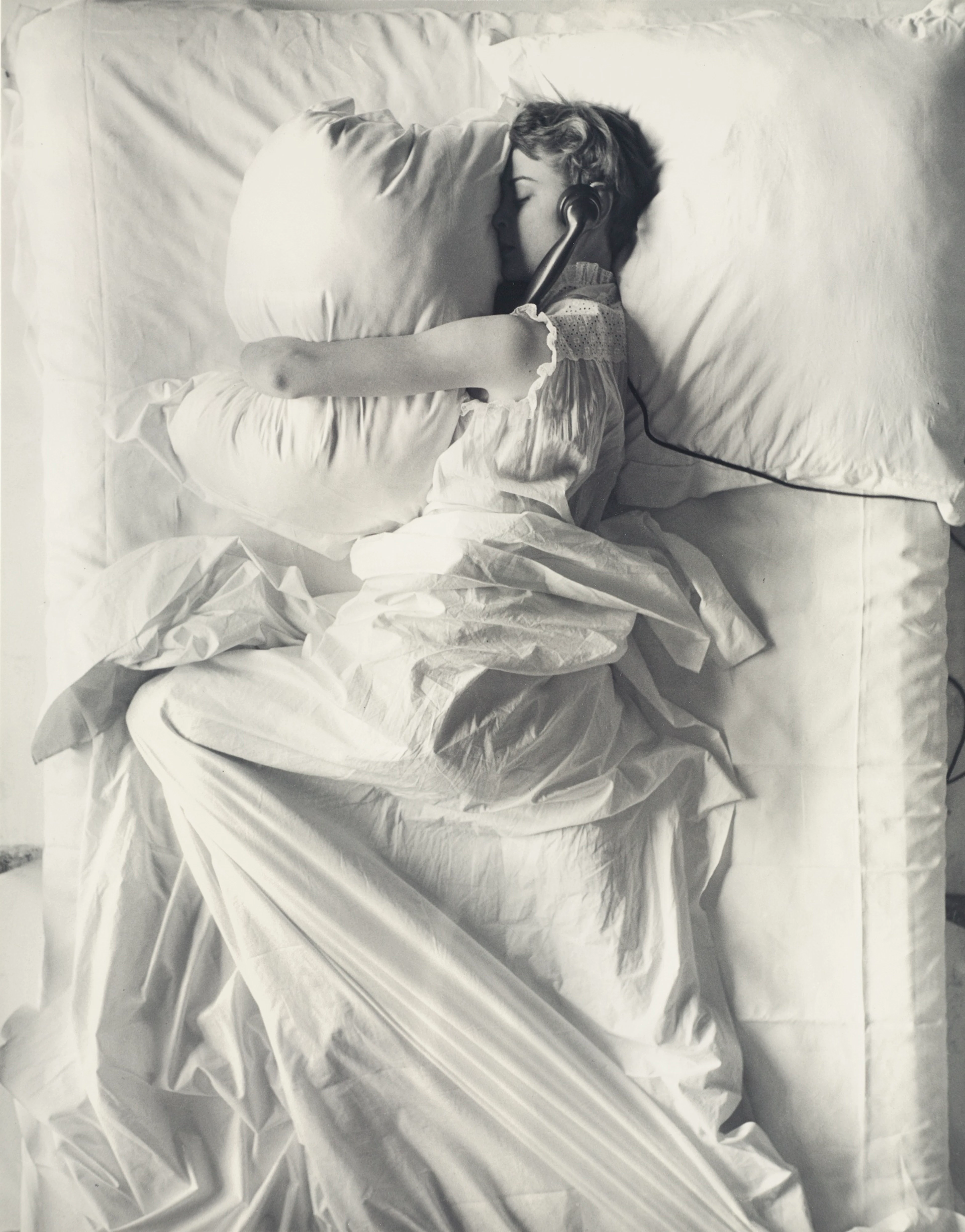 'girl (in bed) on telephone'