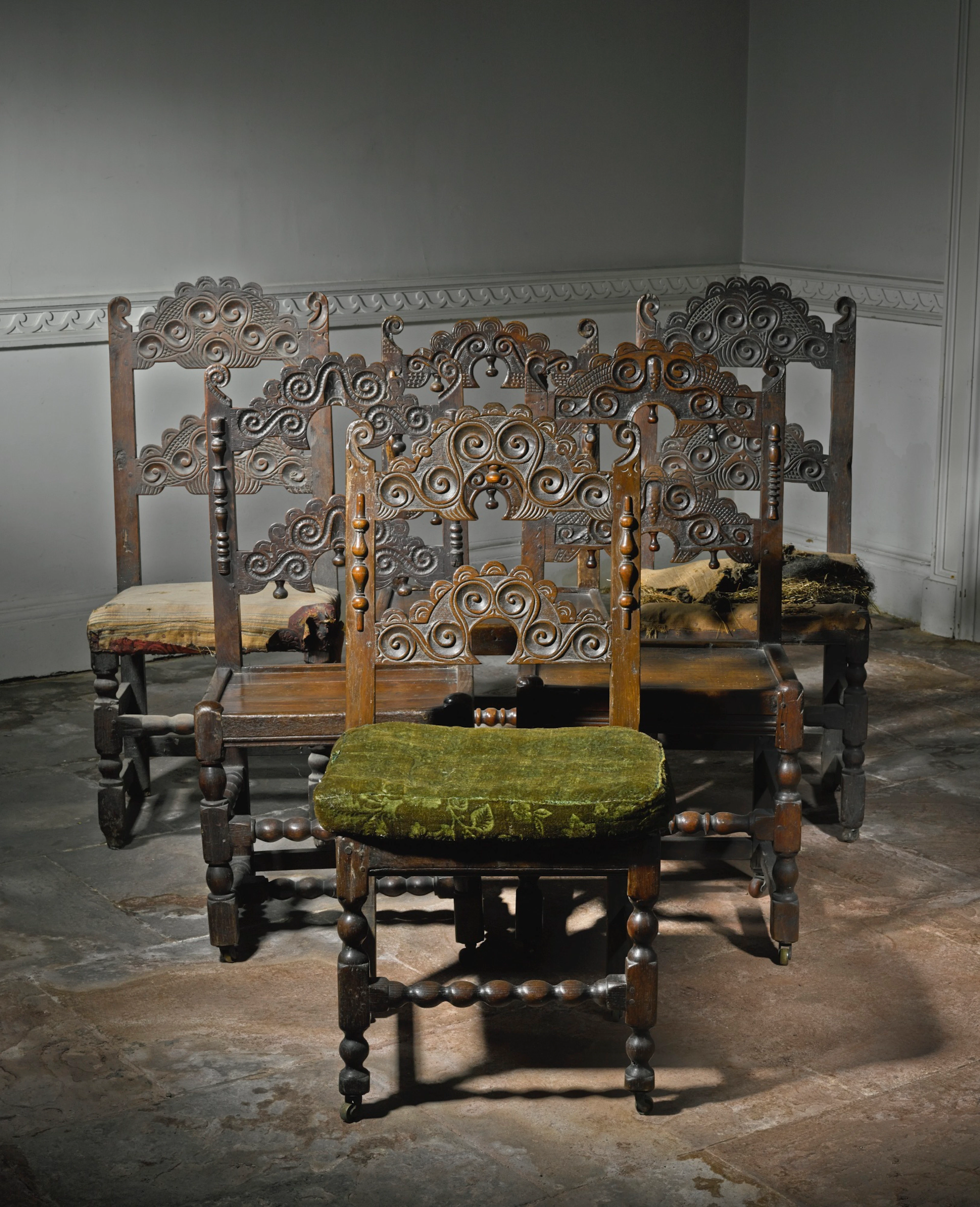 A matched set of six charles ii carved oak side chairs south yorkshire