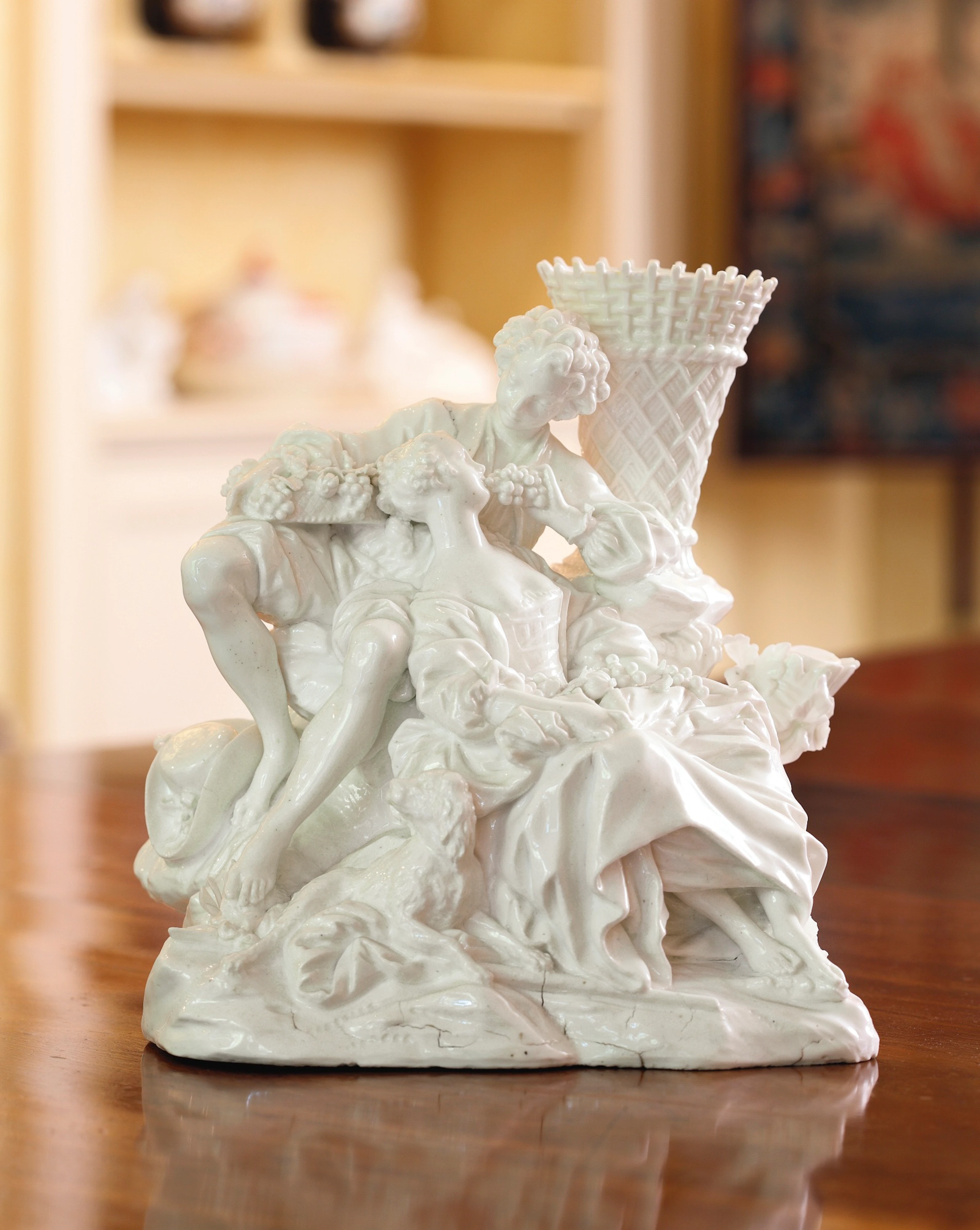A very rare vincennes glazed white group of 'les mangeurs de raisins'