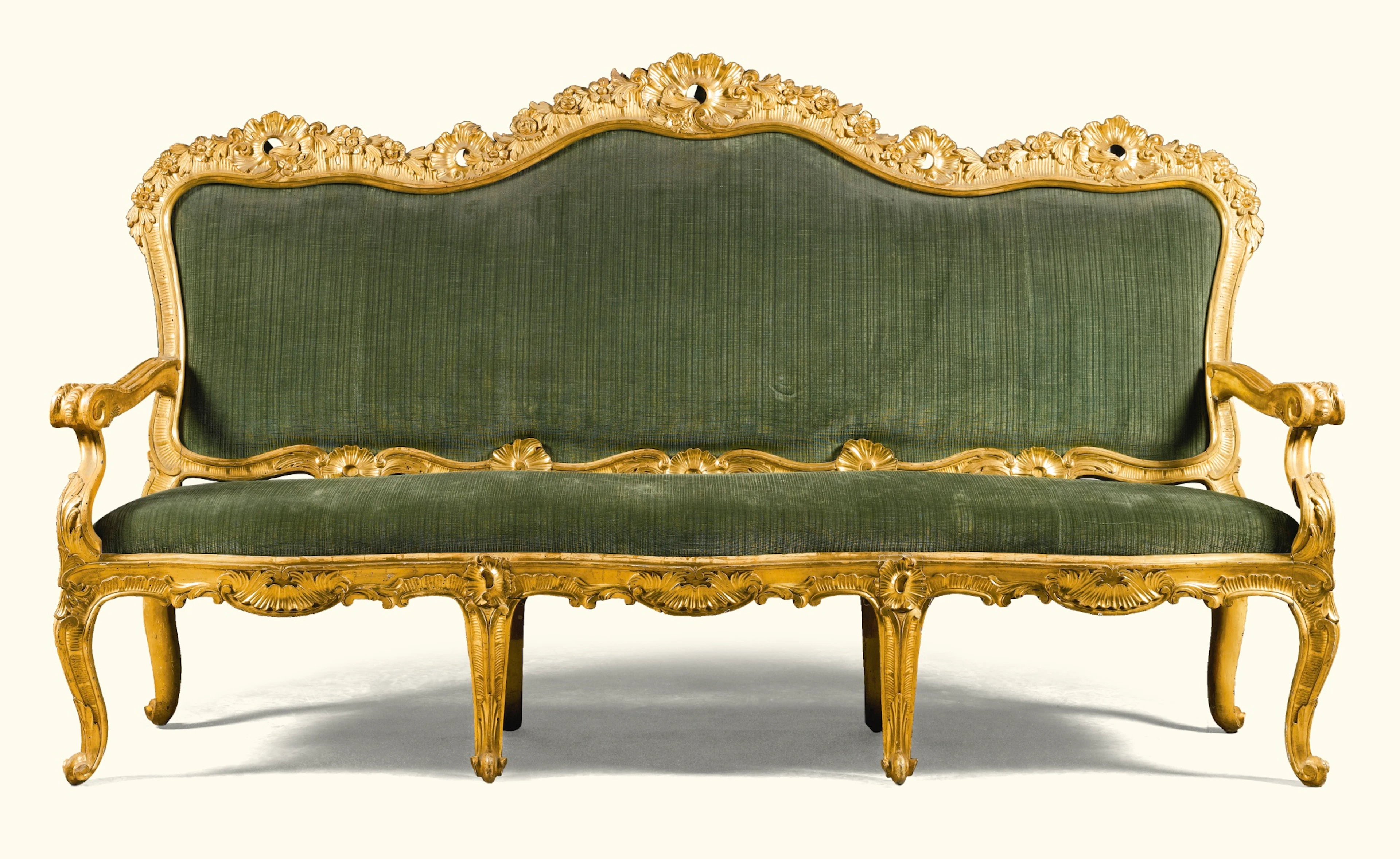 An italian carved giltwood sofa, in the rococo manner, roman late