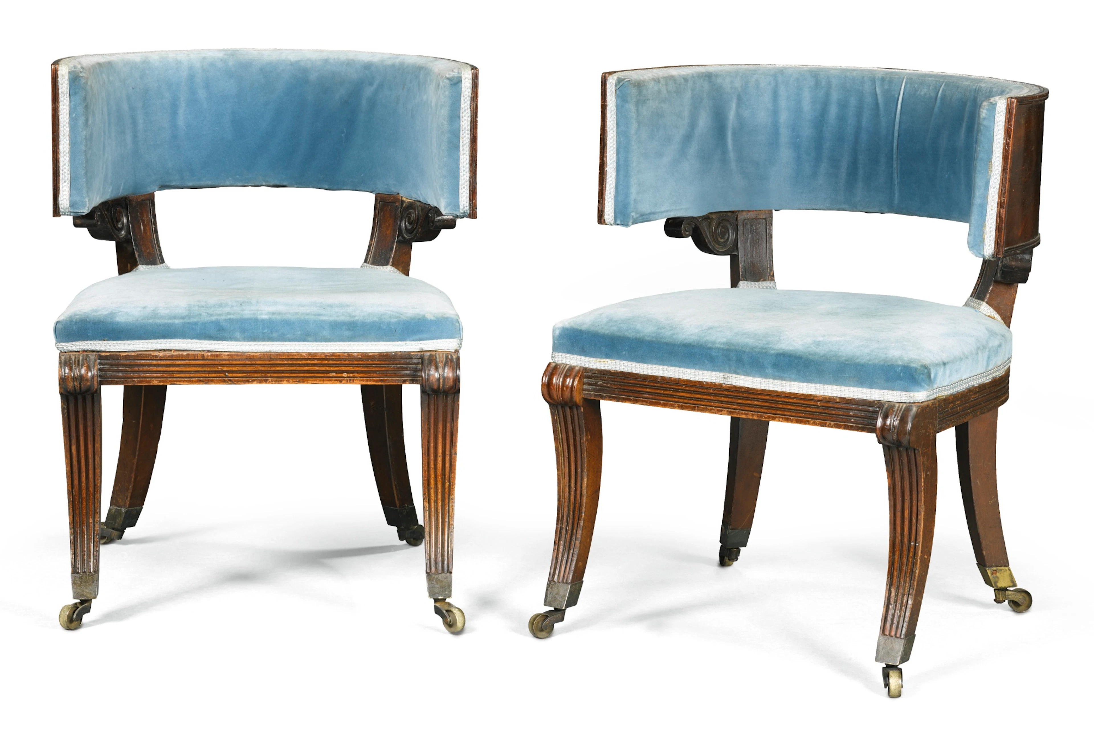 A pair of irish regency mahogany klismos chairs, circa 1810, attributed