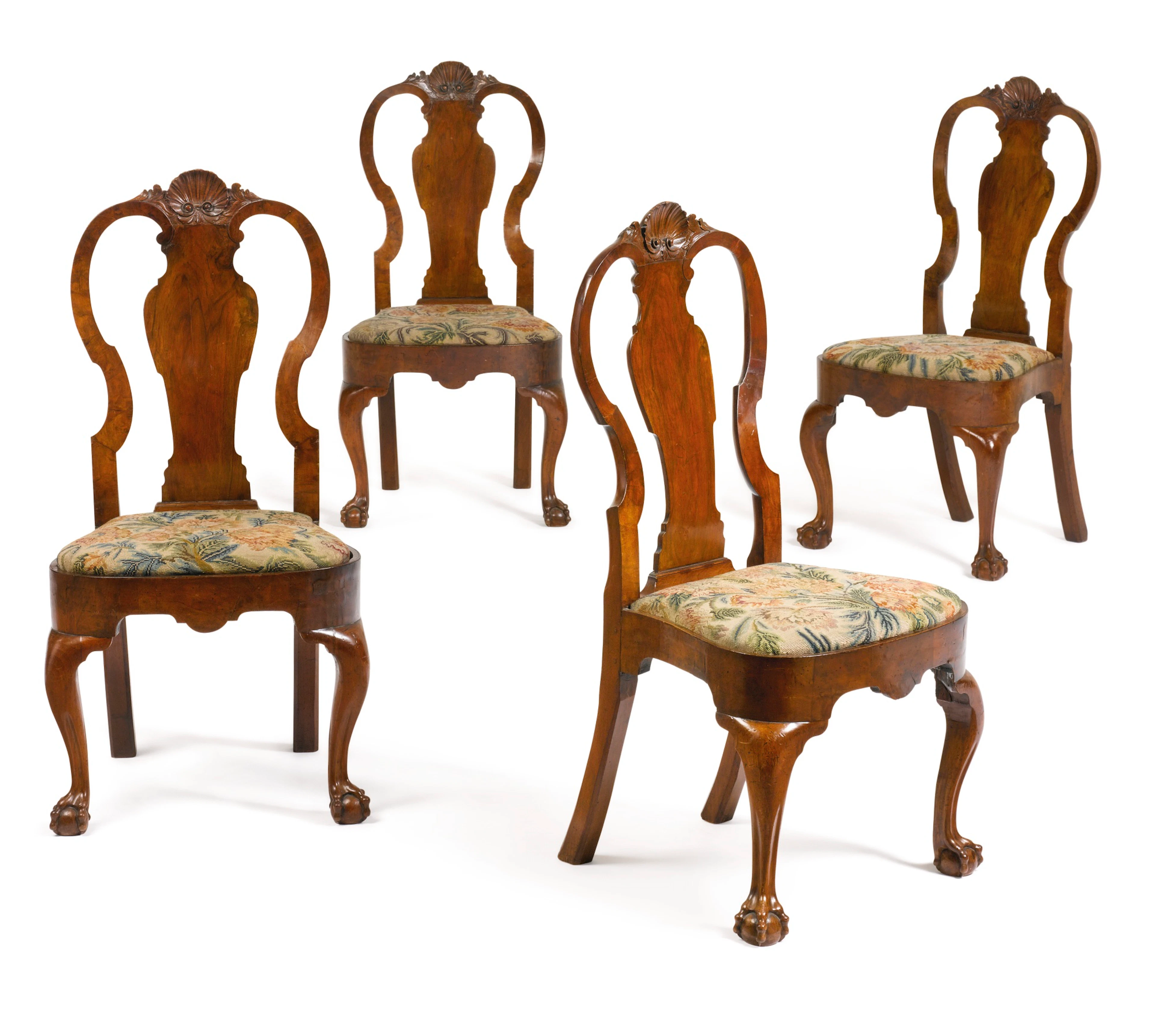 A set of four george i walnut side chairs, first quarter 18th century