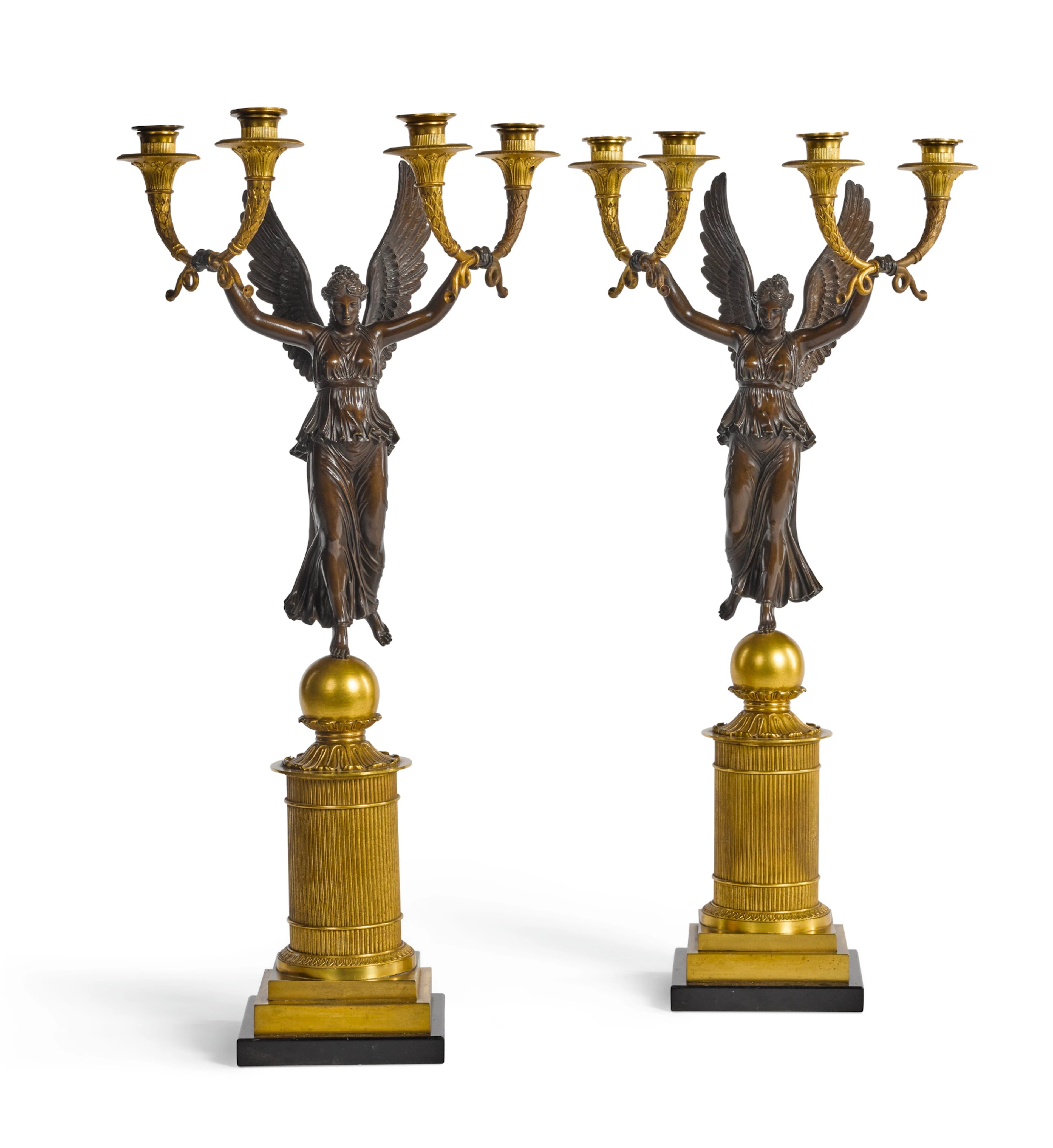 A pair of empire style gilt-bronze and patinated bronze four-light