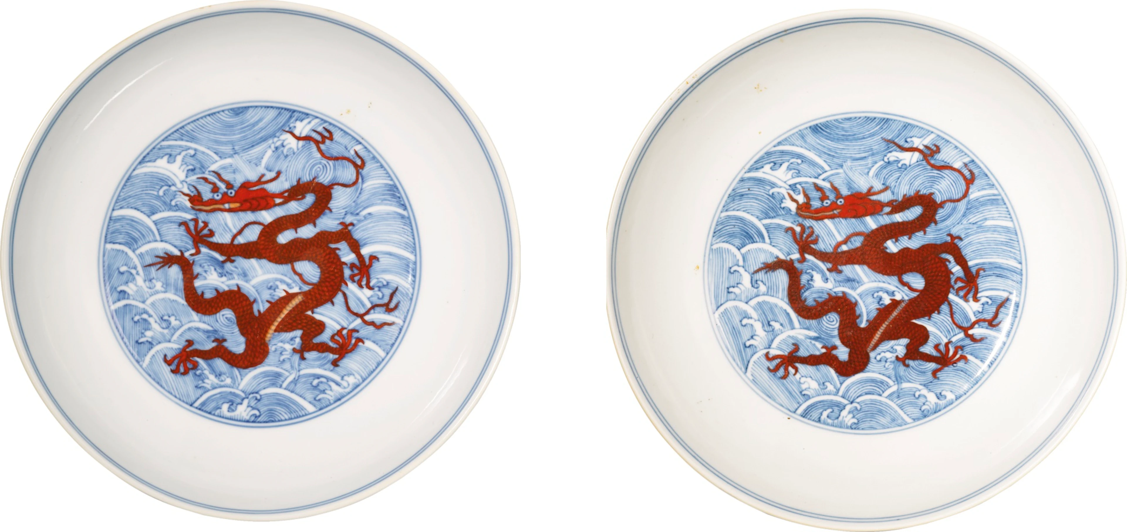 A fine pair of underglaze blue and iron-red 'dragon' dishes qianlong