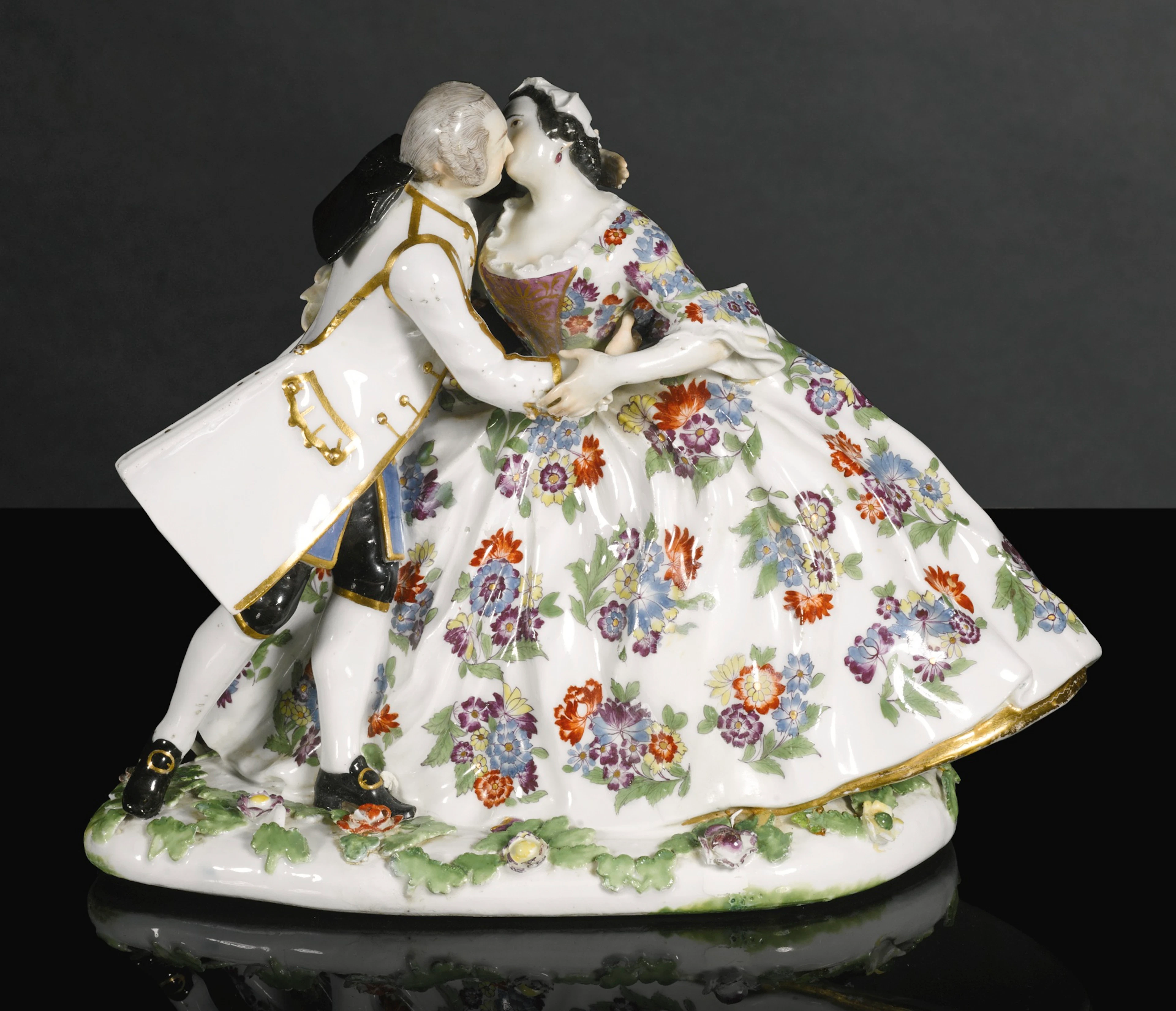 A meissen crinoline group of 'der kuss', circa 1745