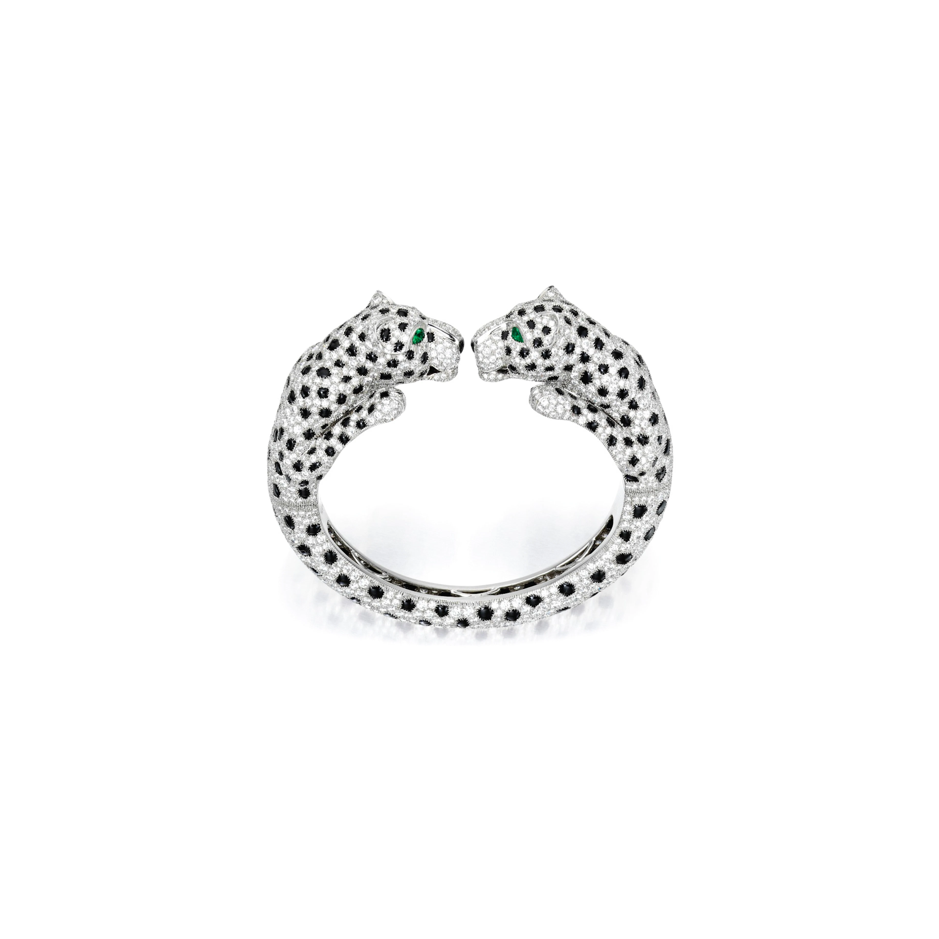 Diamond, onyx and emerald 'double panther' bracelet, cartier, france
