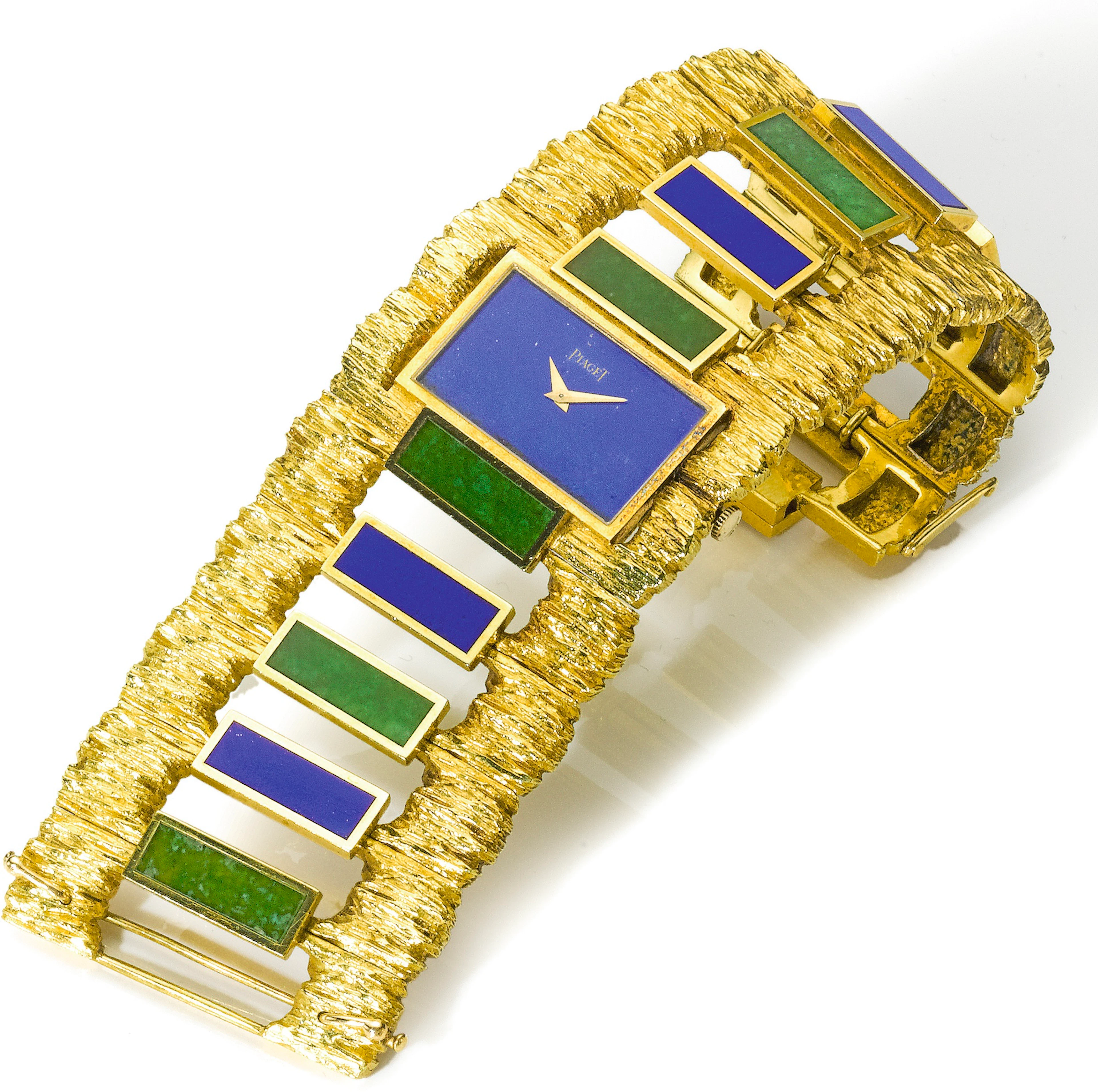A lady's yellow gold lapis lazuli and nephrite bracelet...