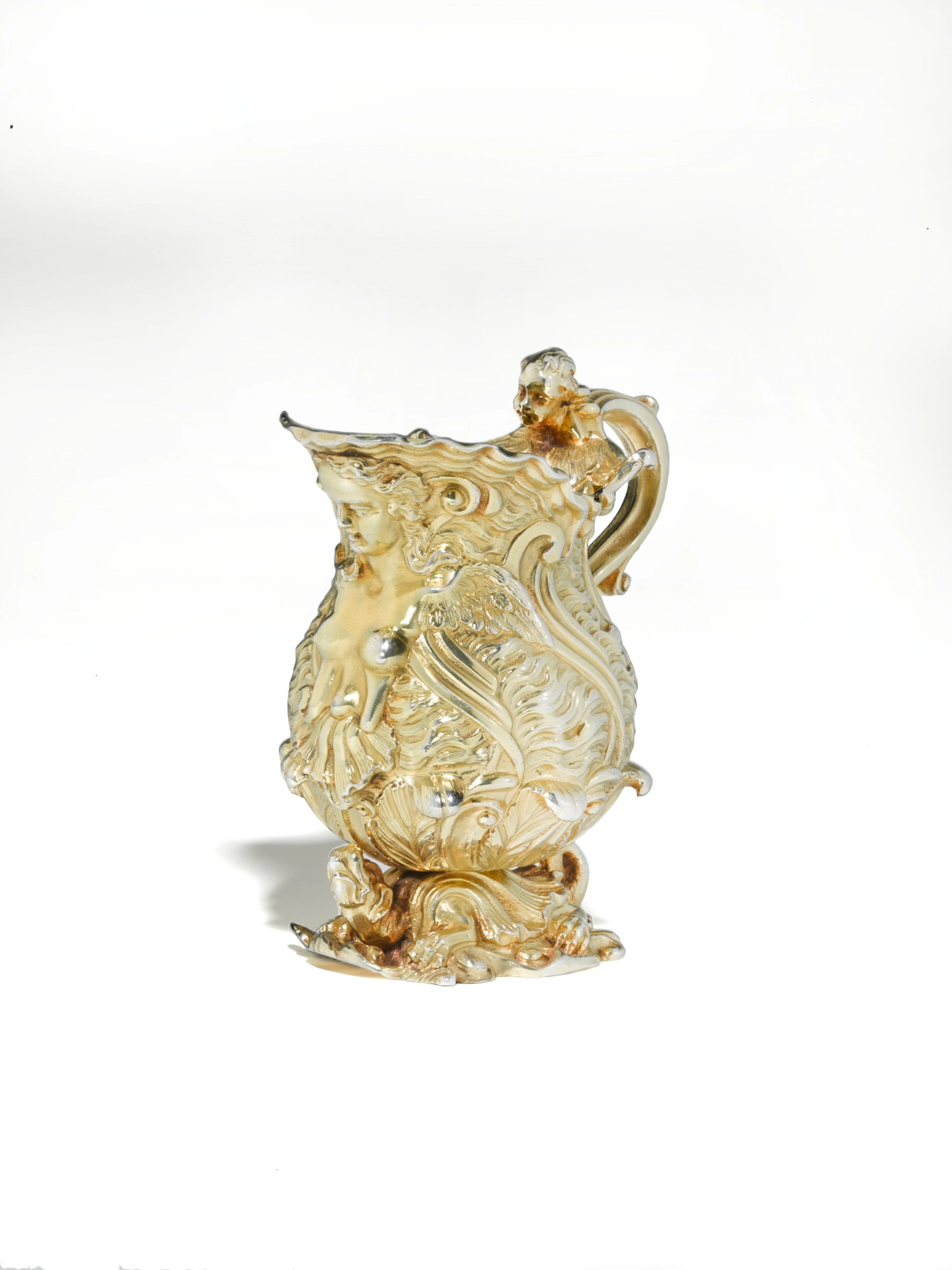 A george ii silver-gilt cream jug