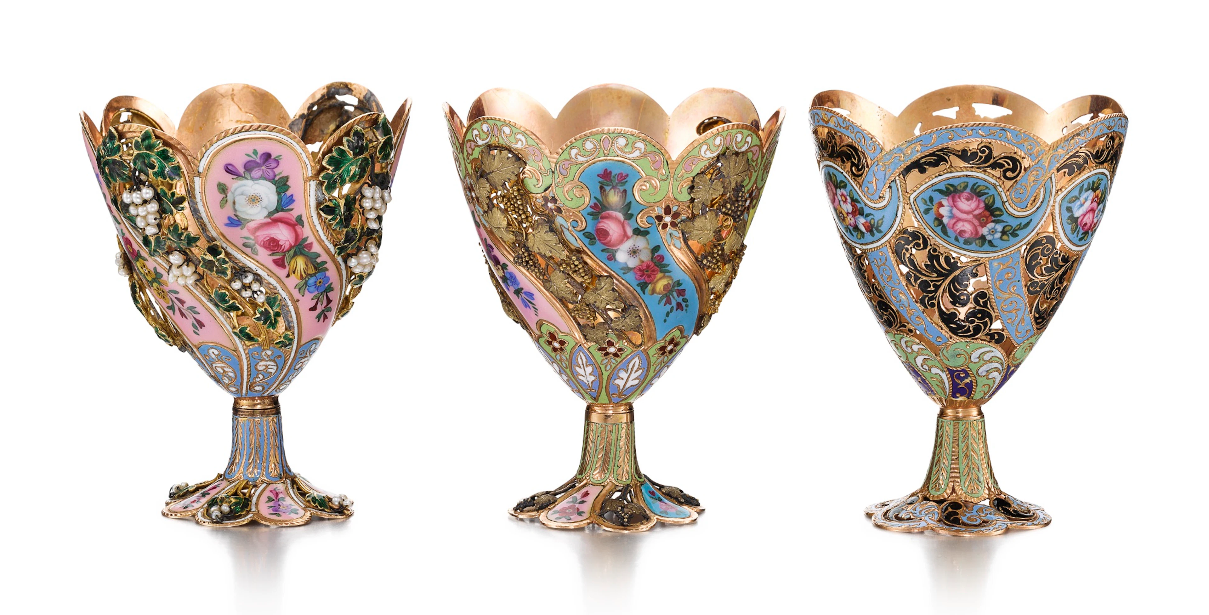 Three two-colour gold and enamelled partly openwork zarfs