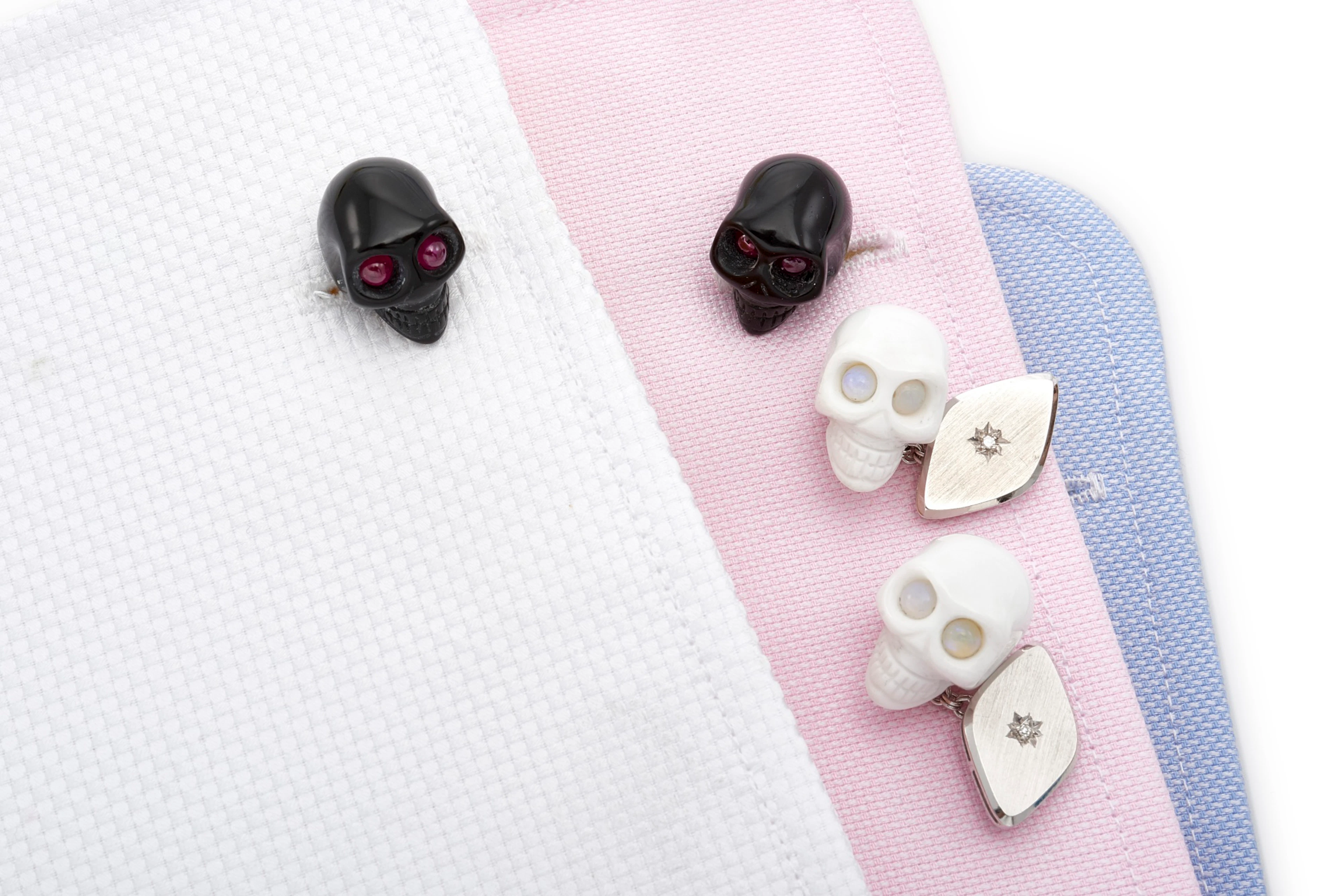 ONE PAIR OF ARTIFICIAL GLASS AND RUBY CUFFLINKS