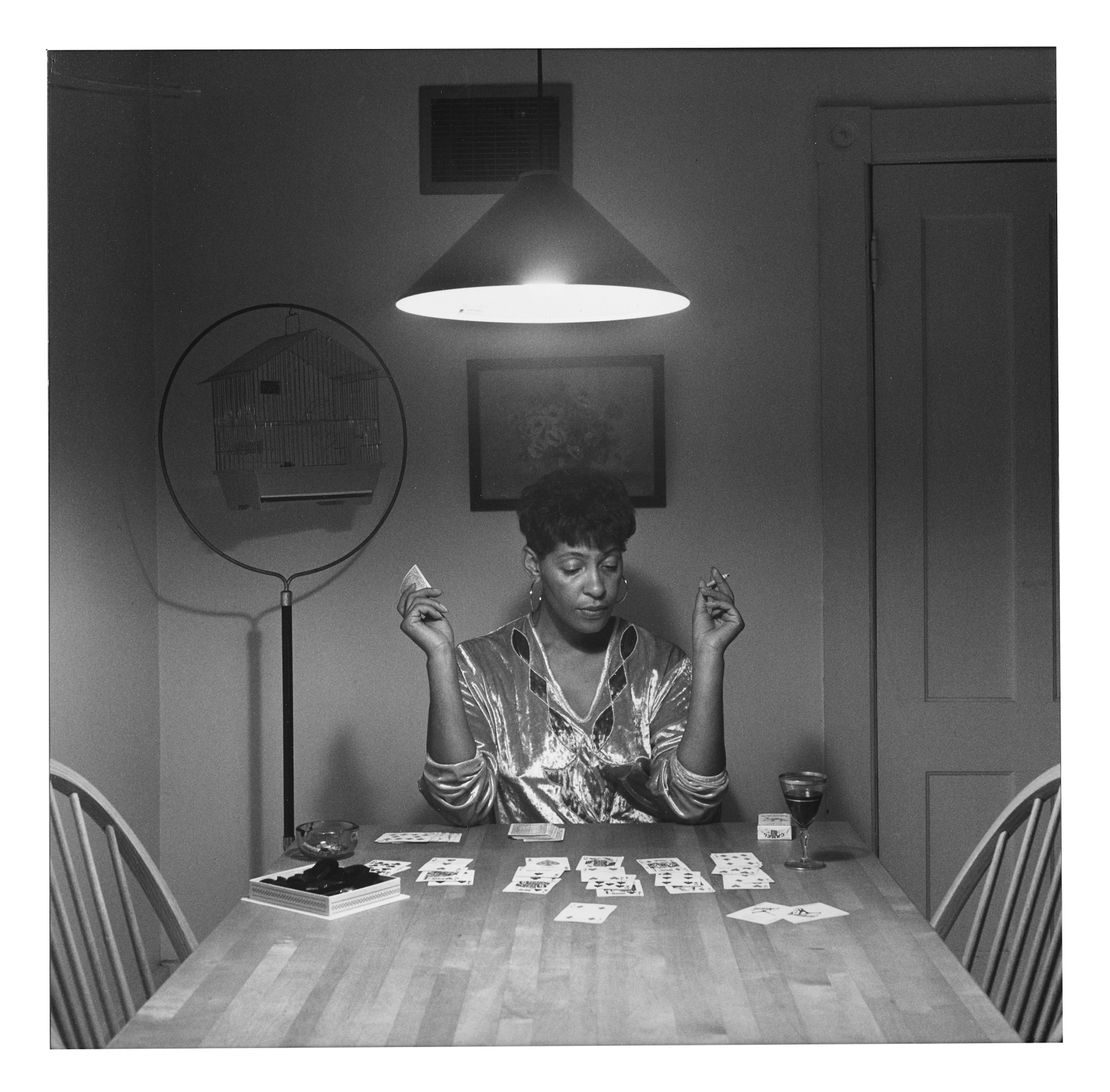 Untitled (Woman Playing Solitaire from Kitchen Table Series)