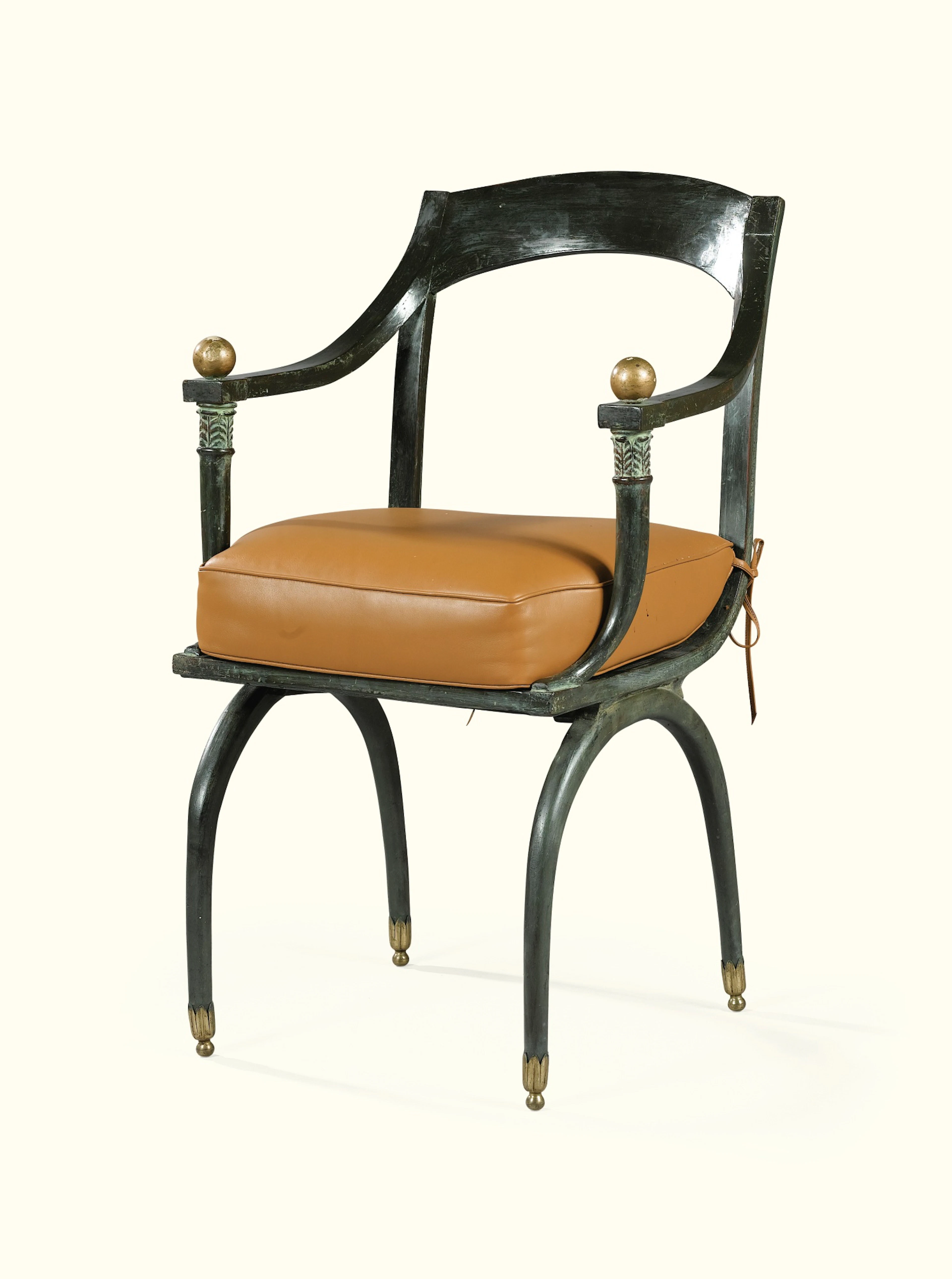 A SIMULATED BRONZE AND PAINTED WOODEN CURULE ARMCHAIR