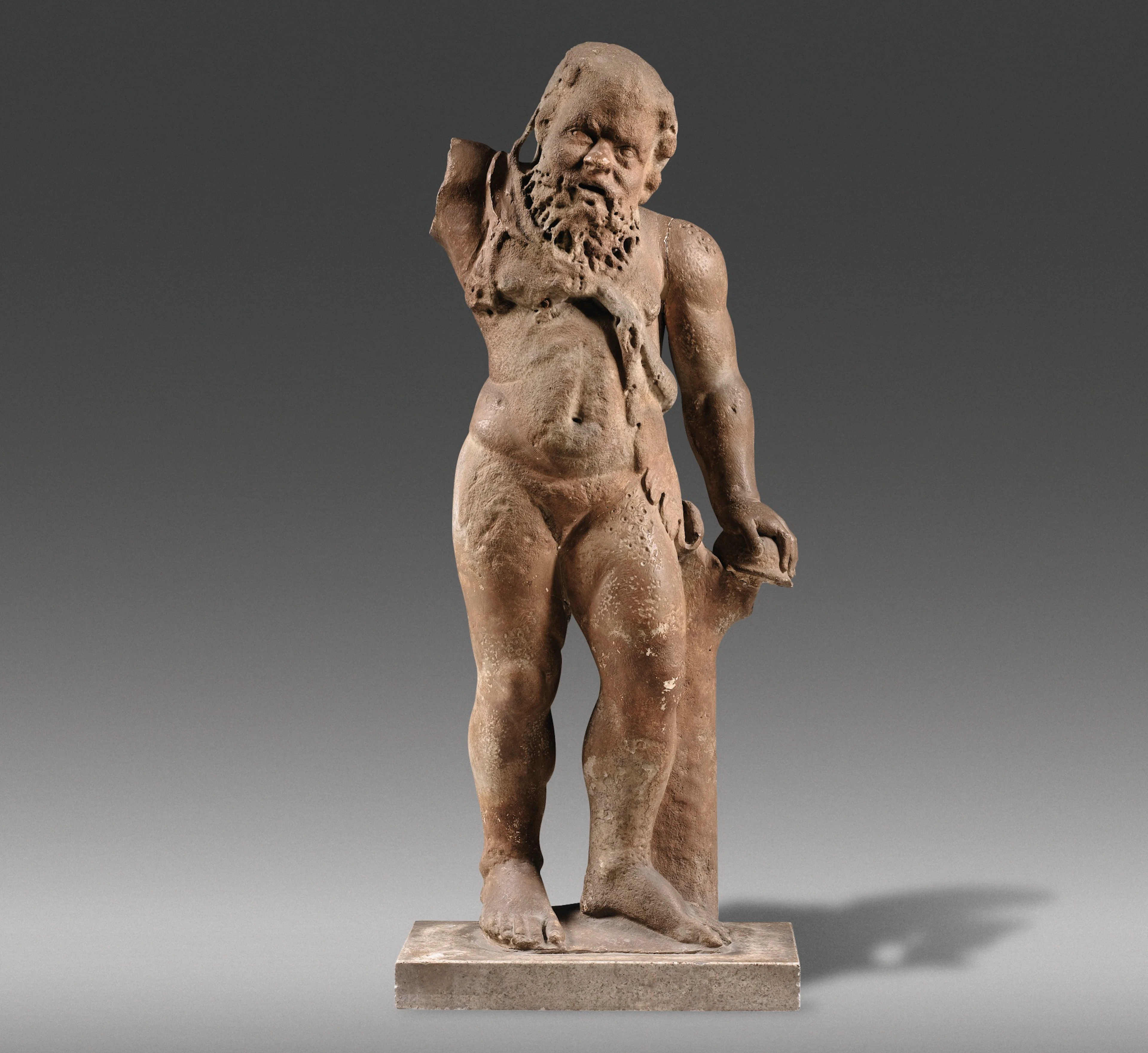 A ROMAN MARBLE FIGURE OF SILENUS