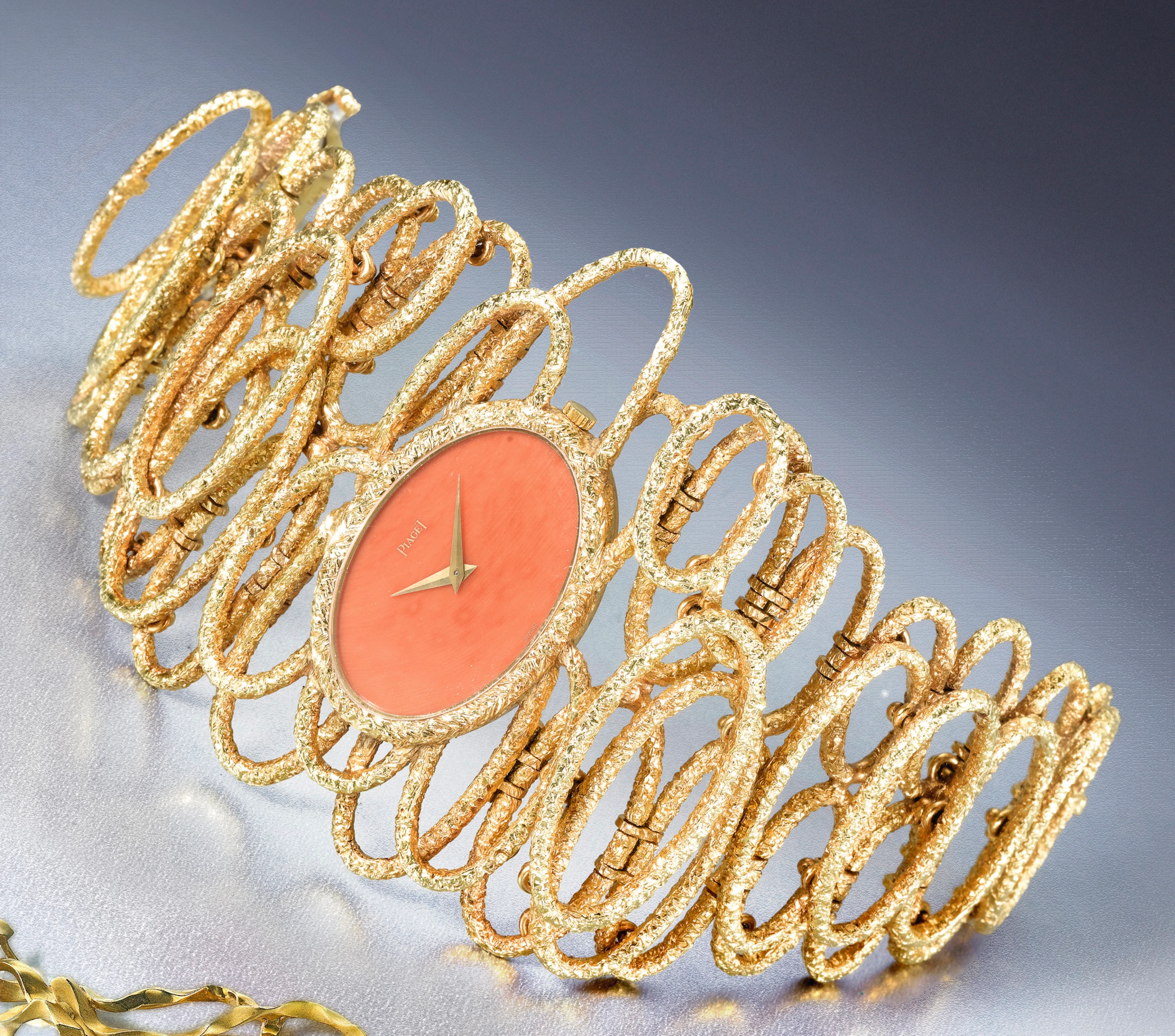 Esclave ref 9850a fine yellow gold bracelet watch with coral dial made in 1970