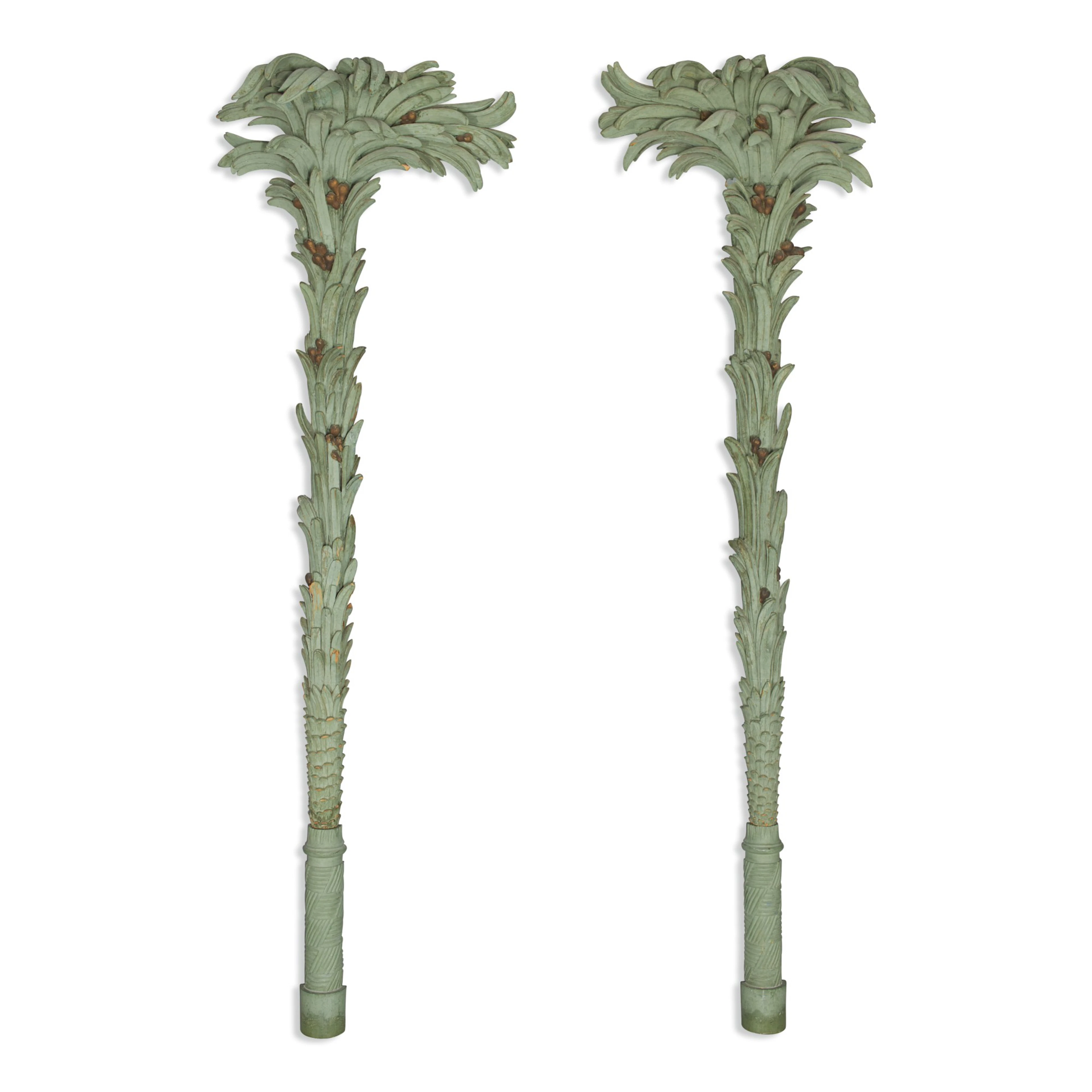 A pair of large green-painted carved wooden palm fronds, 20th century