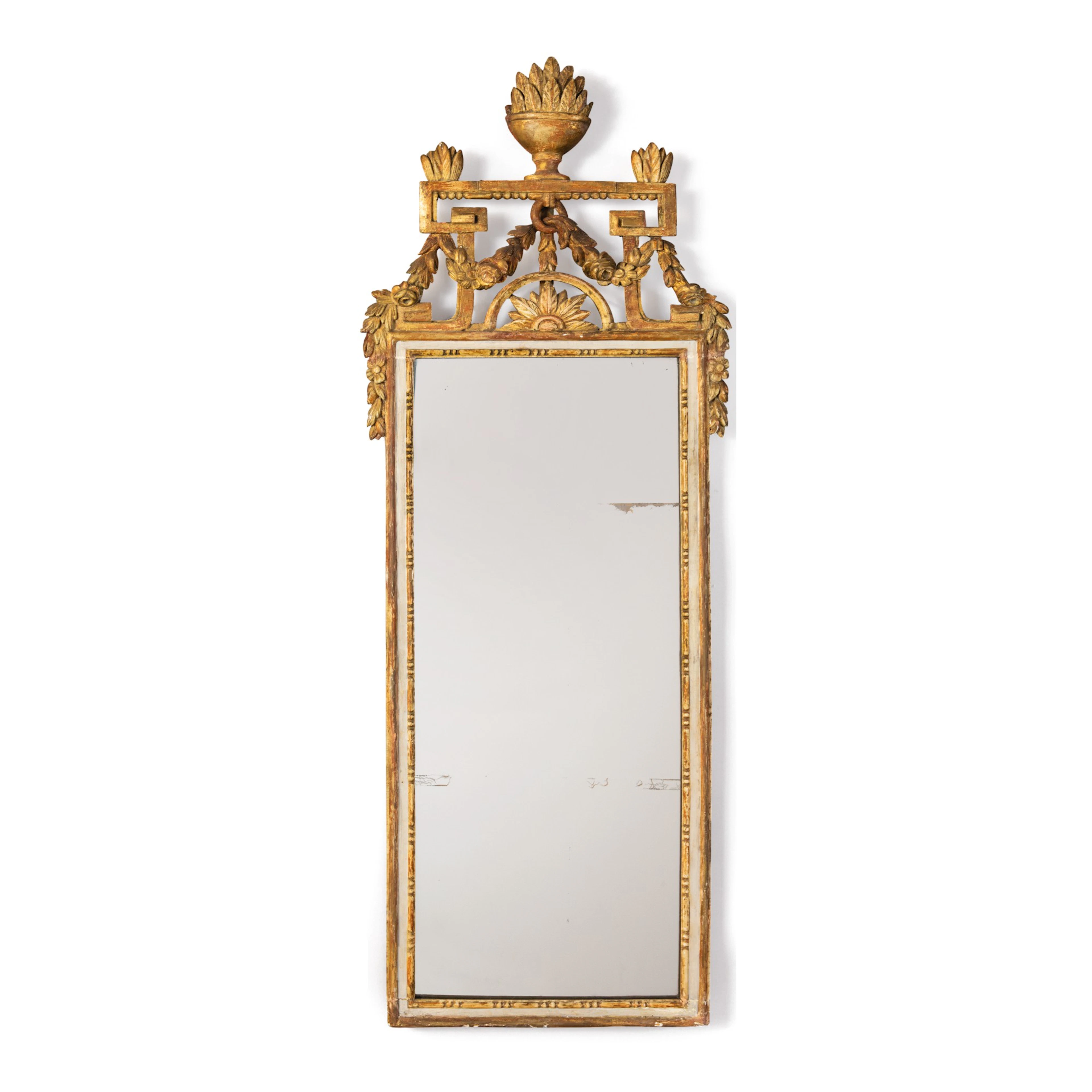 A parcel gilt white-painted tuscan neoclassical giltwood mirror, circa 1800