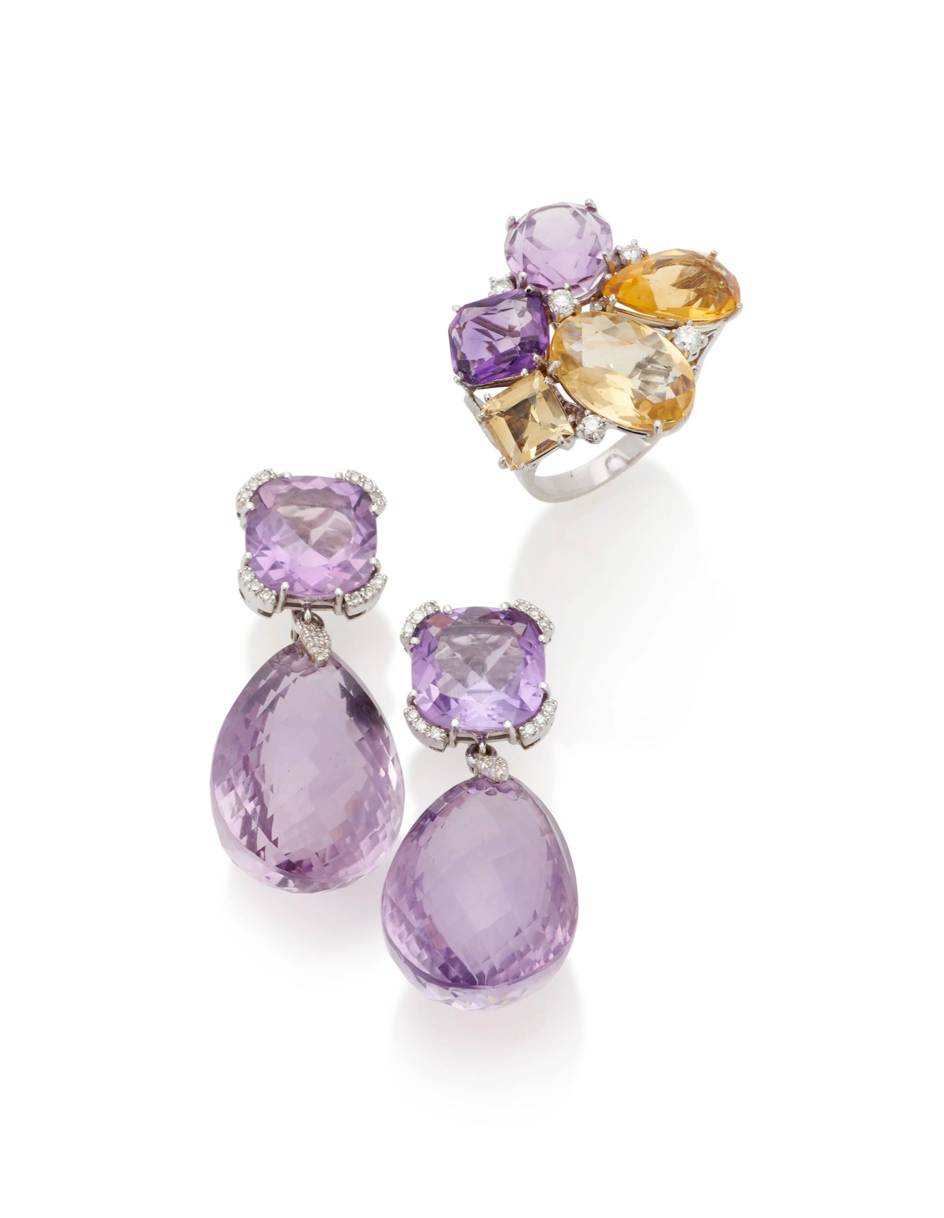 Pair of amethyst and diamond pendent earrings and gemset...