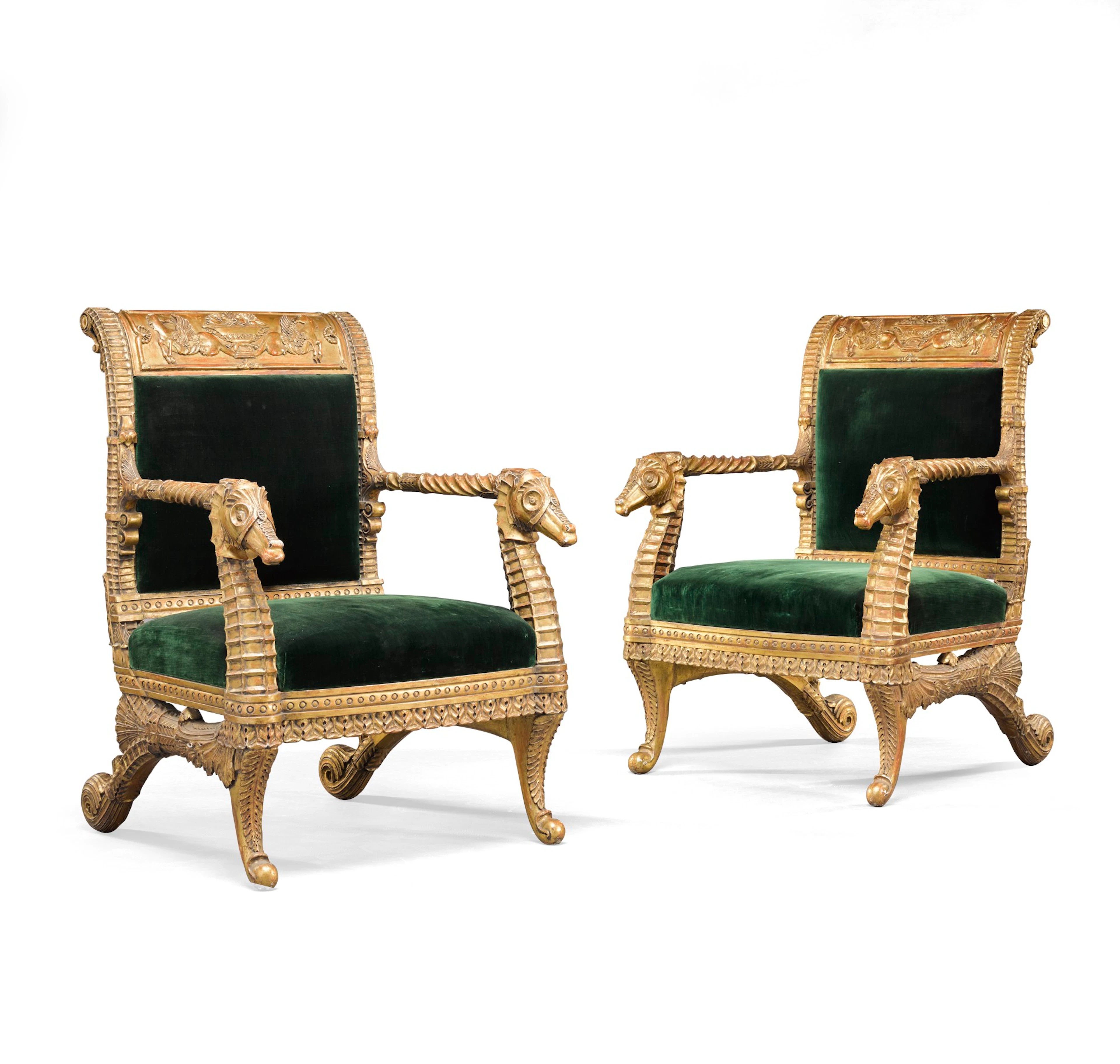 A pair of carved giltwood armchairs in sicilian 19th century style