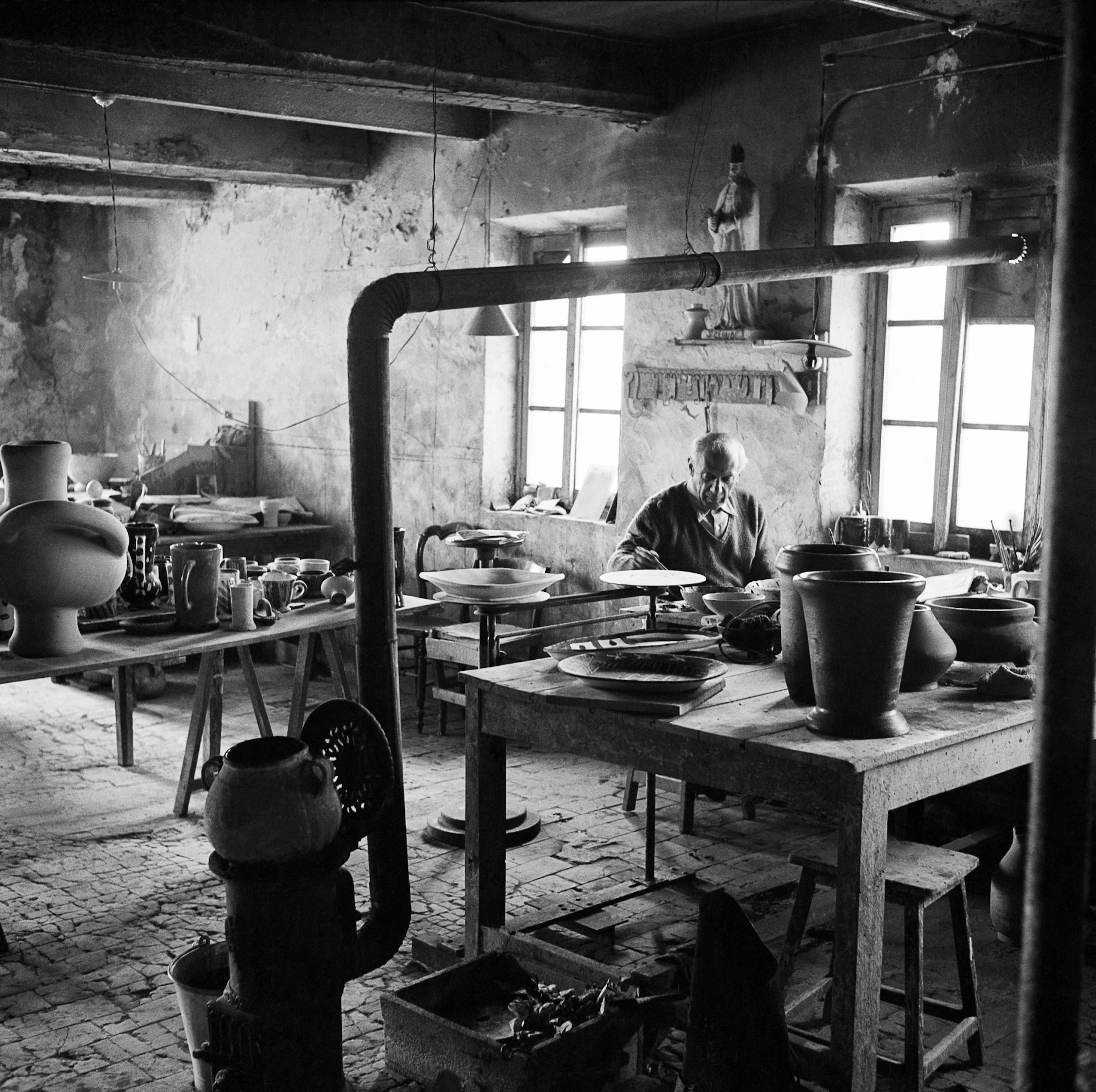 Edward quinn | 'pablo picasso at work at the madoura pottery in vallauris', 1951