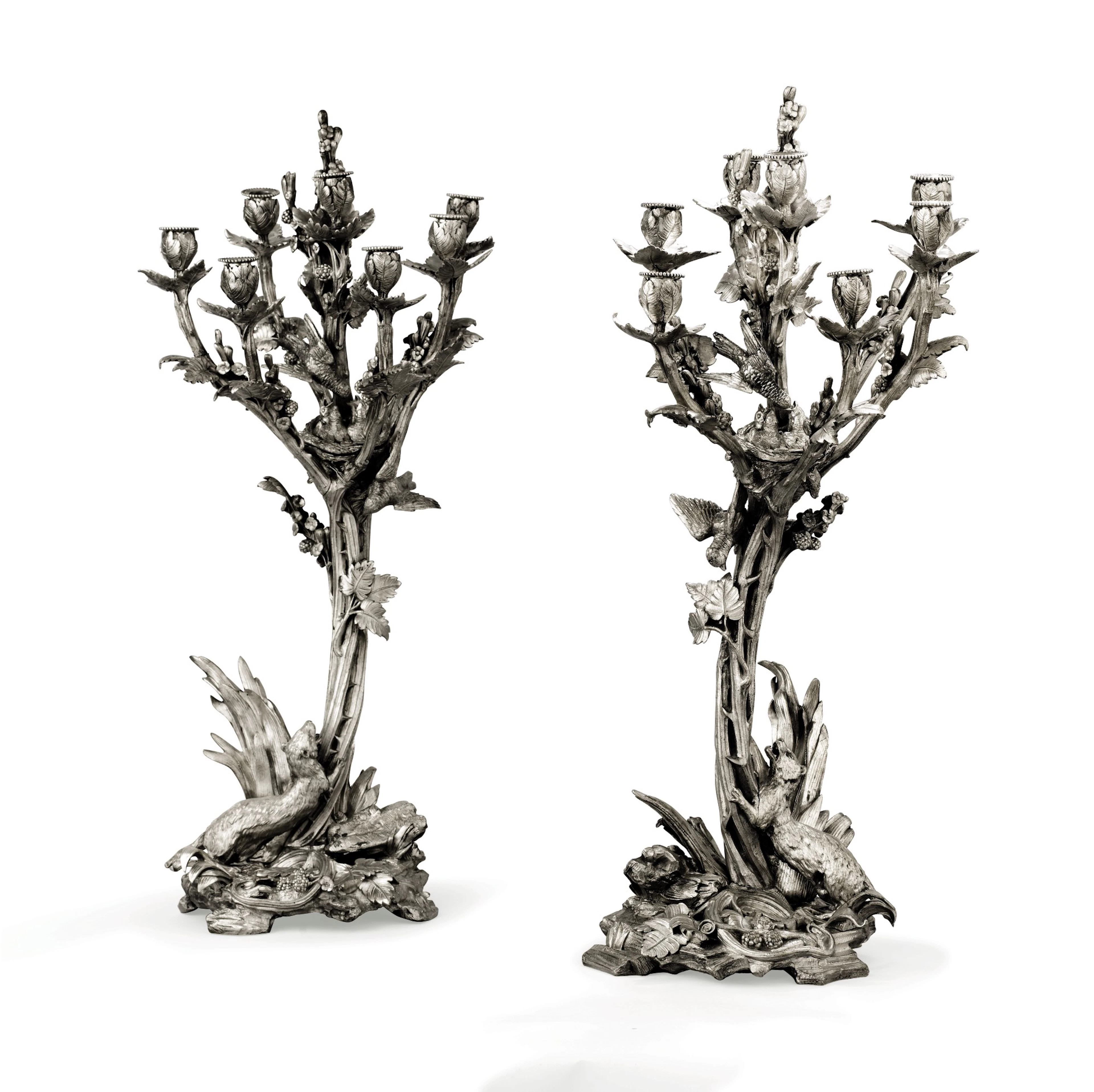 A pair of large silver-plated bronze seven-light candelabra