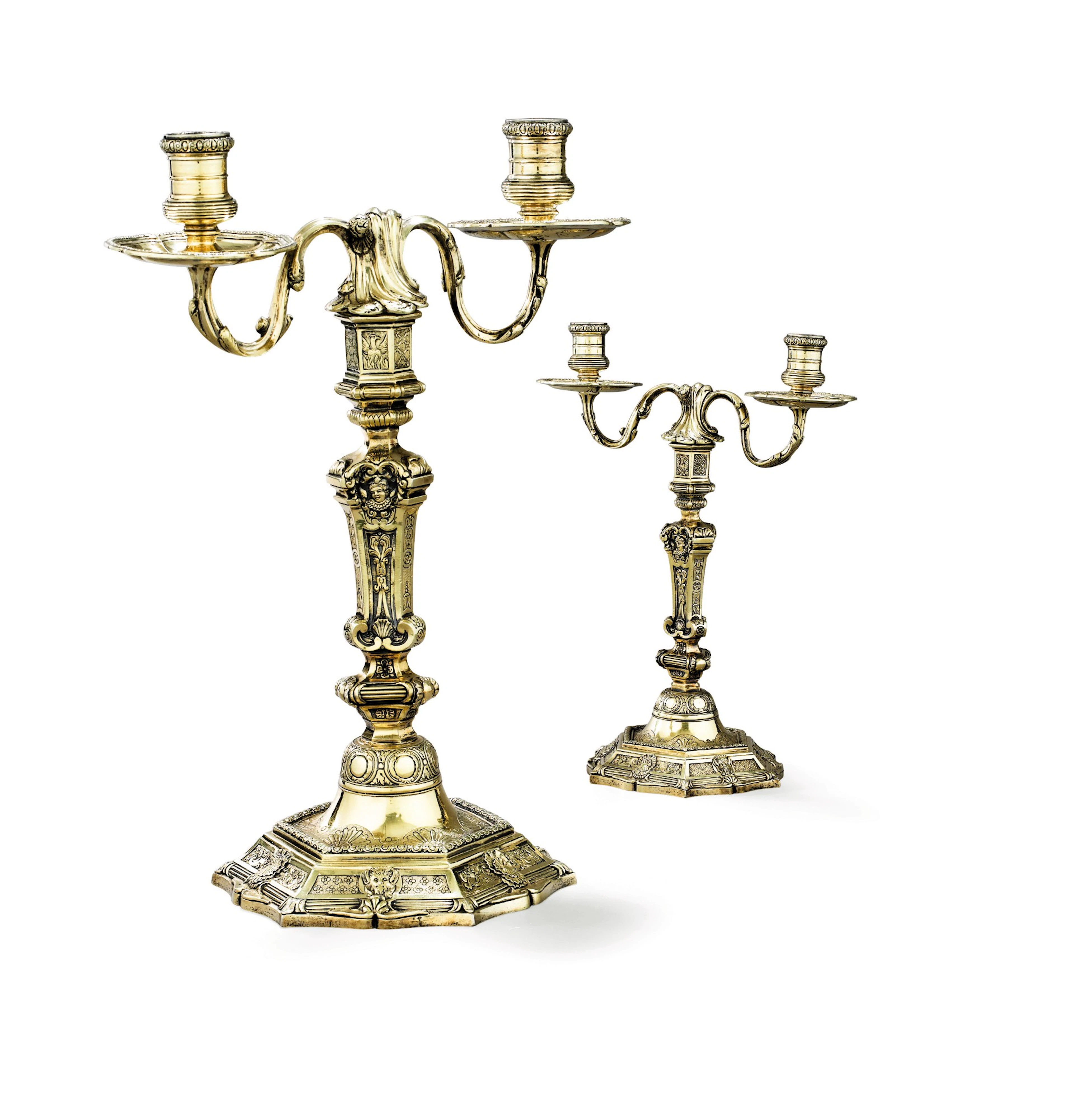 A pair of two-light silver-gilt candelabra