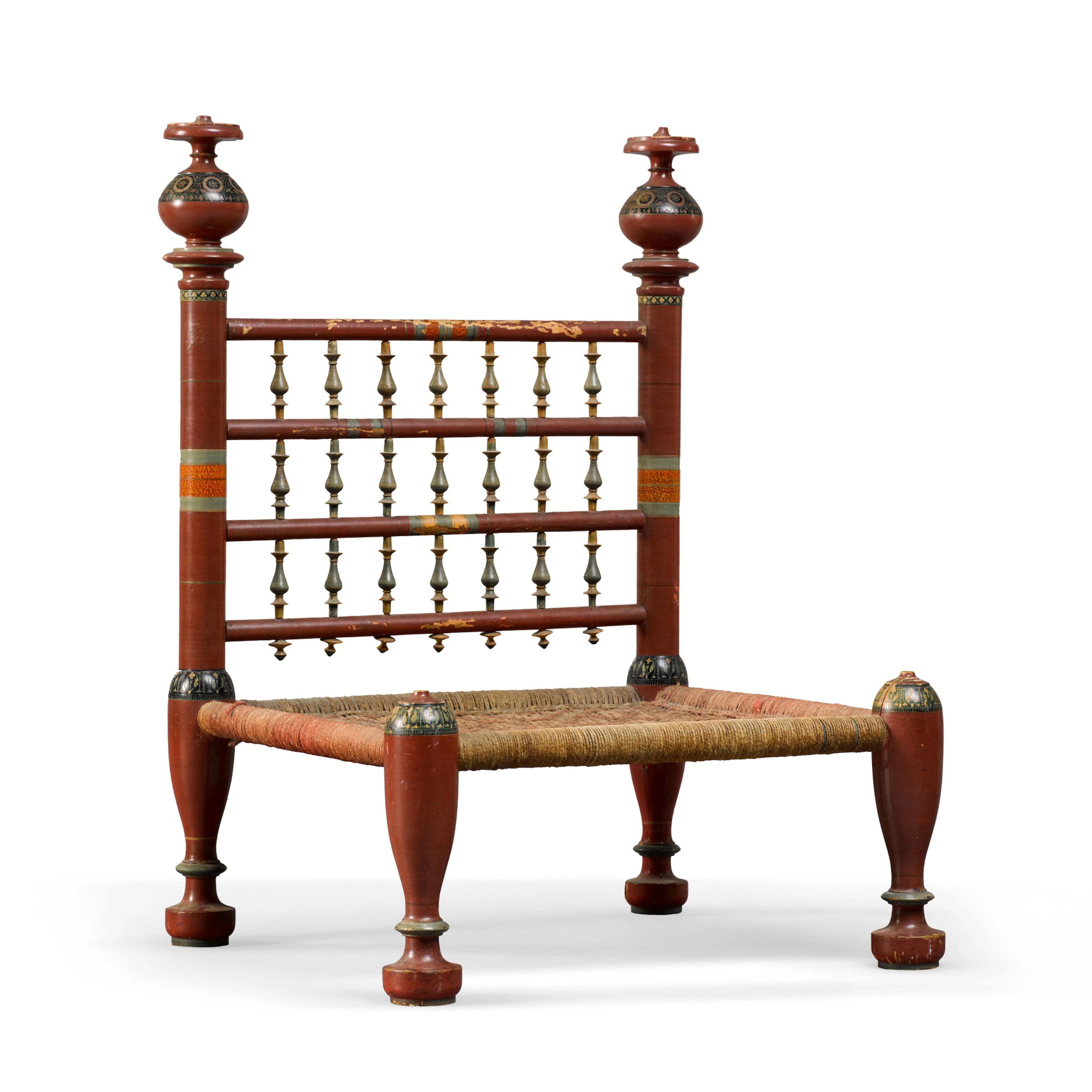 A rare japanned and polychrome decorated beech low chair...