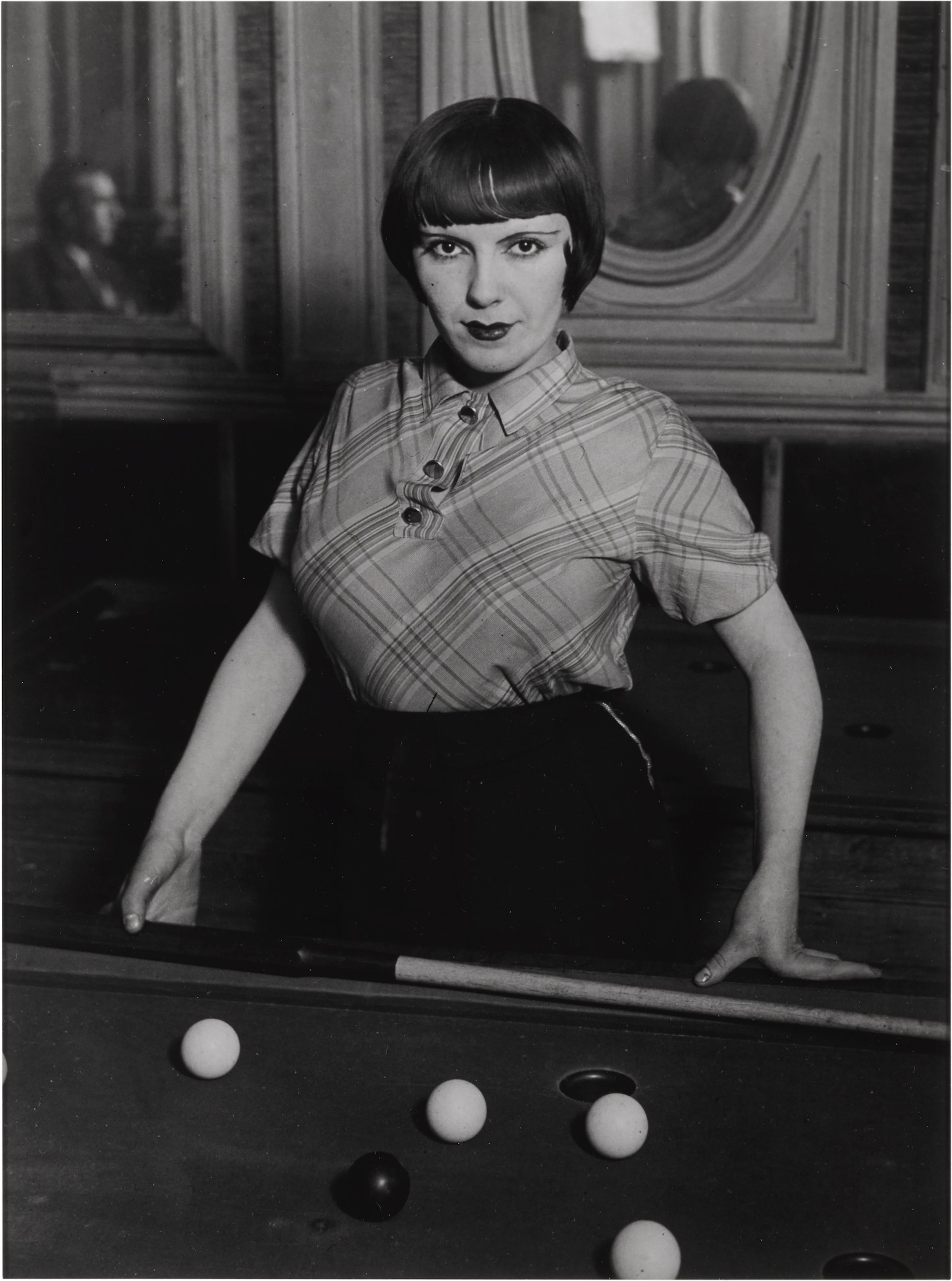 Brassaï | prostitute playing russian billiards, boulevard rochechouart