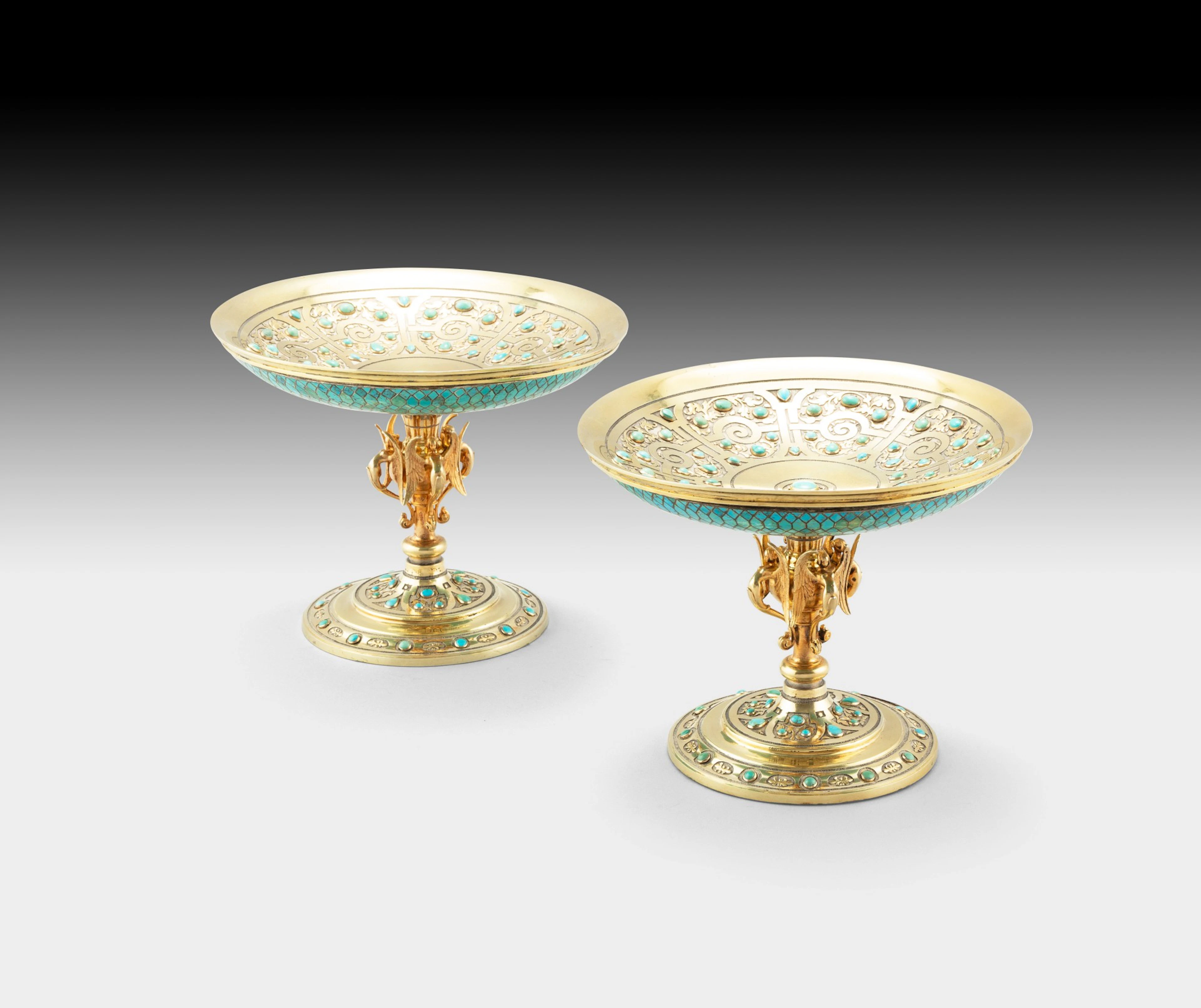 A pair of silver-gilt and turquoise cups