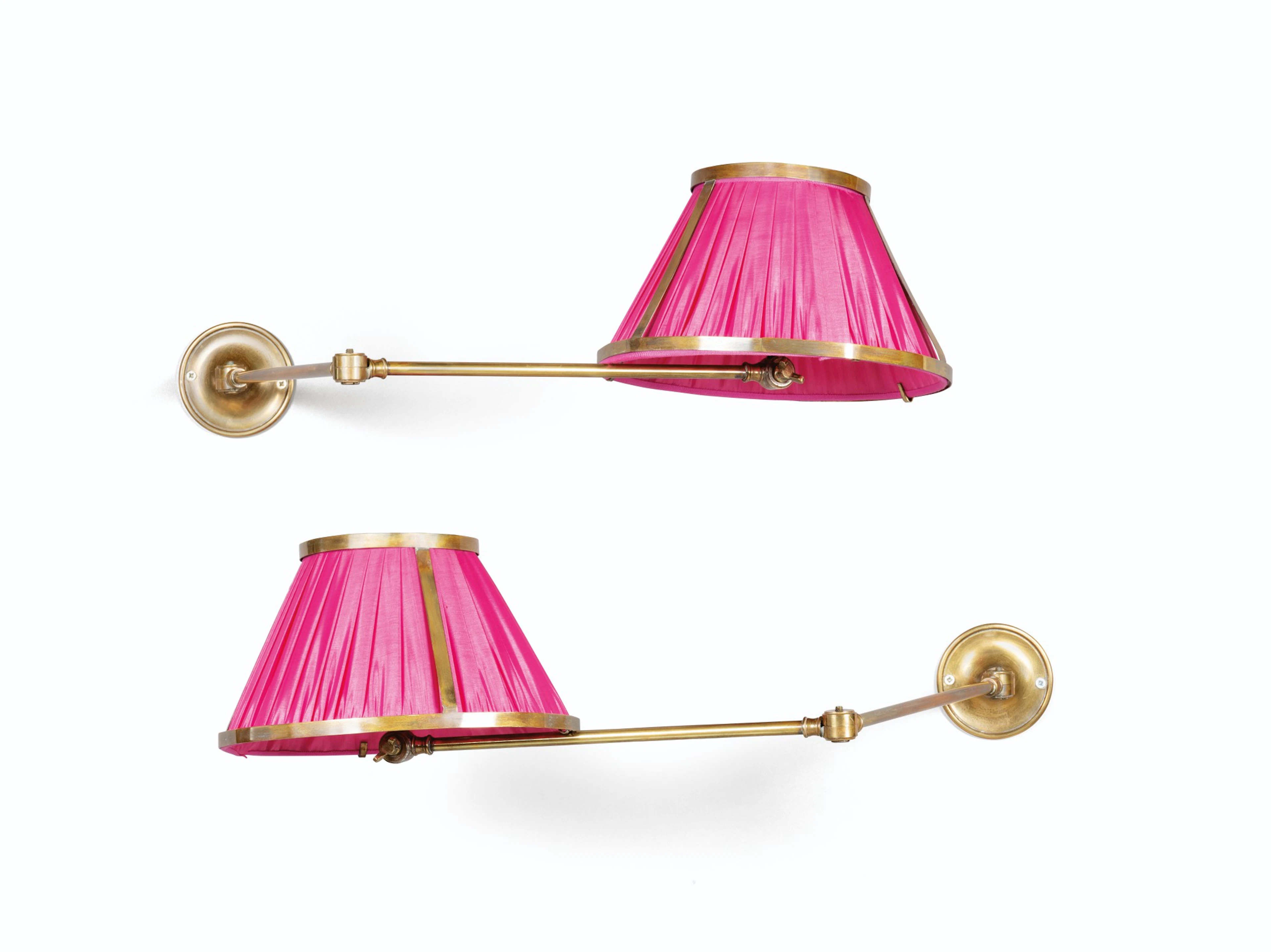 A pair of modern gilt-brass wall appliques attributed to la Galerie des Lampes