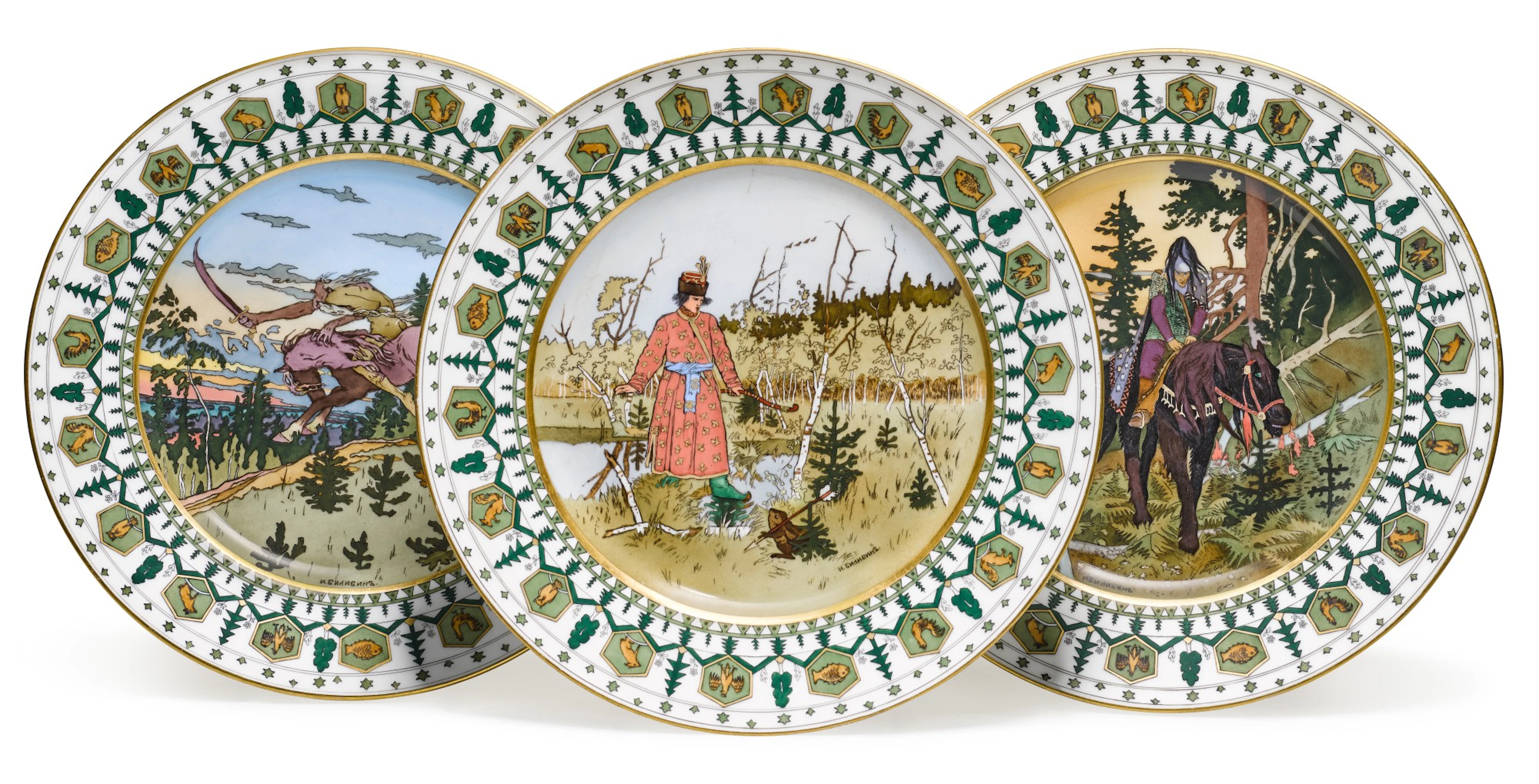 A set of three porcelain plates with fairy tale scenes
