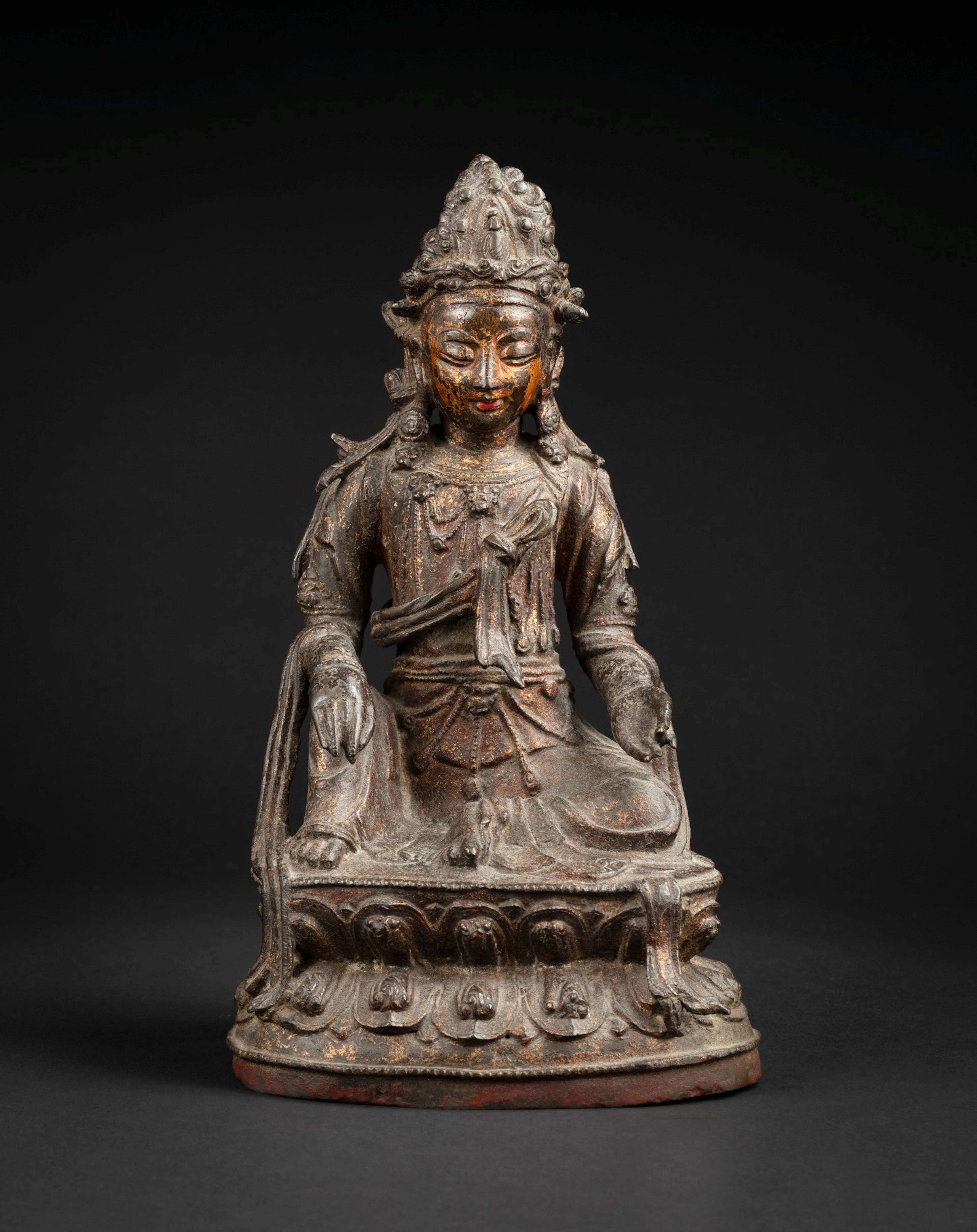 A lacquered-gilt bronze seated Avalokitesvara Ming dynasty | 明 漆金銅觀世音菩薩坐像