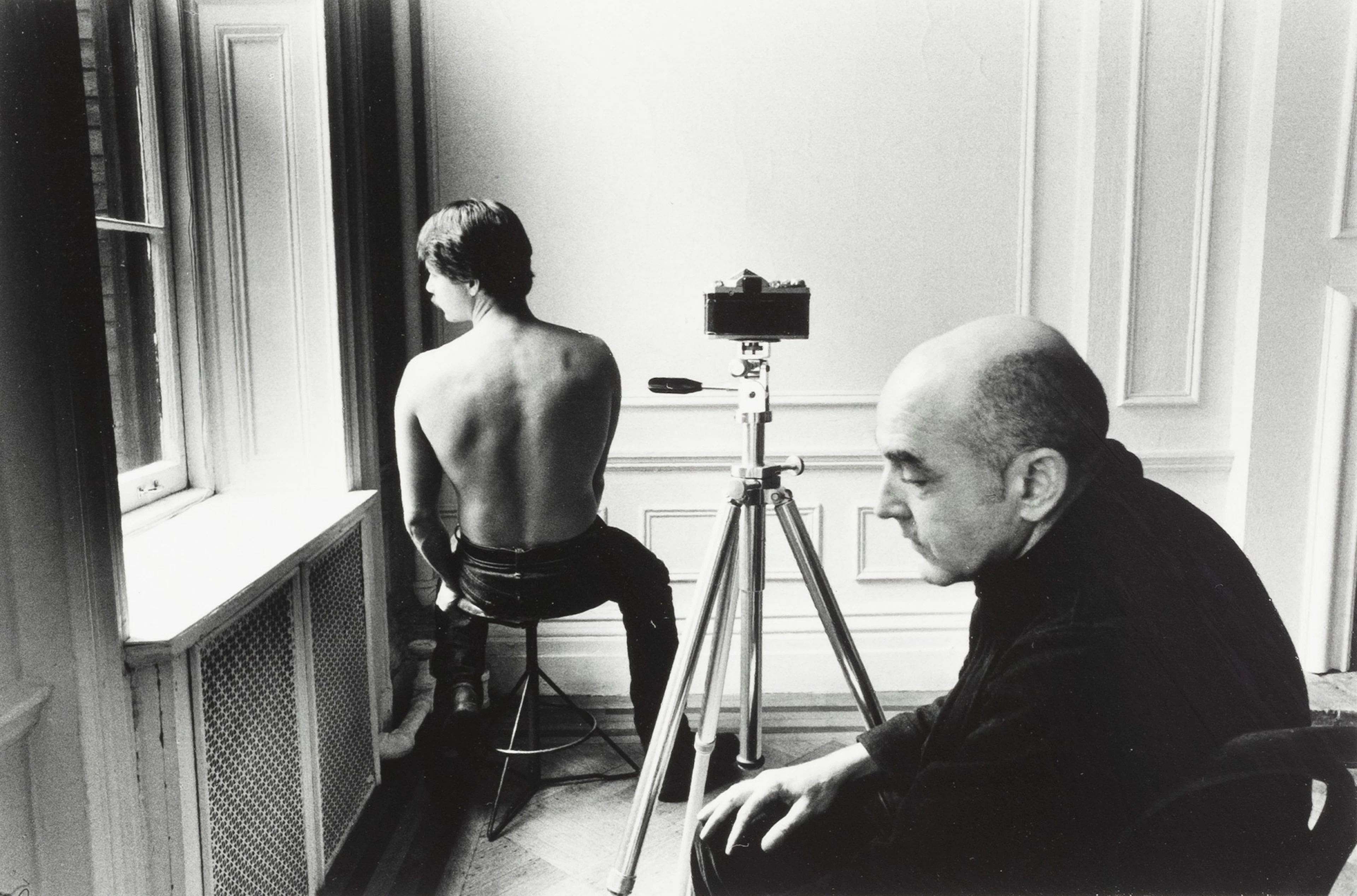 The old man photographs the young man, 1978