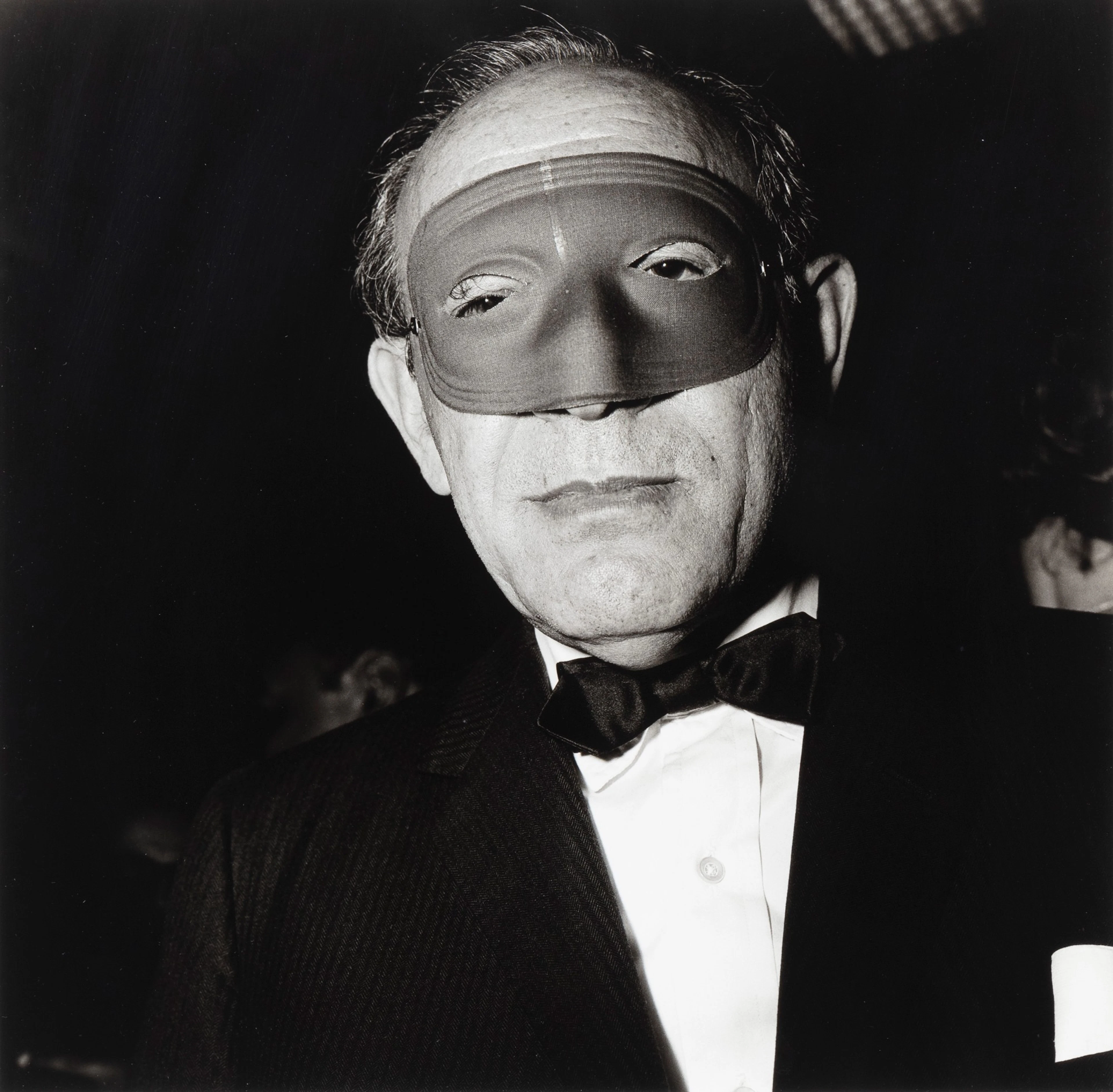 Masked man at a ball, NYC, 1967