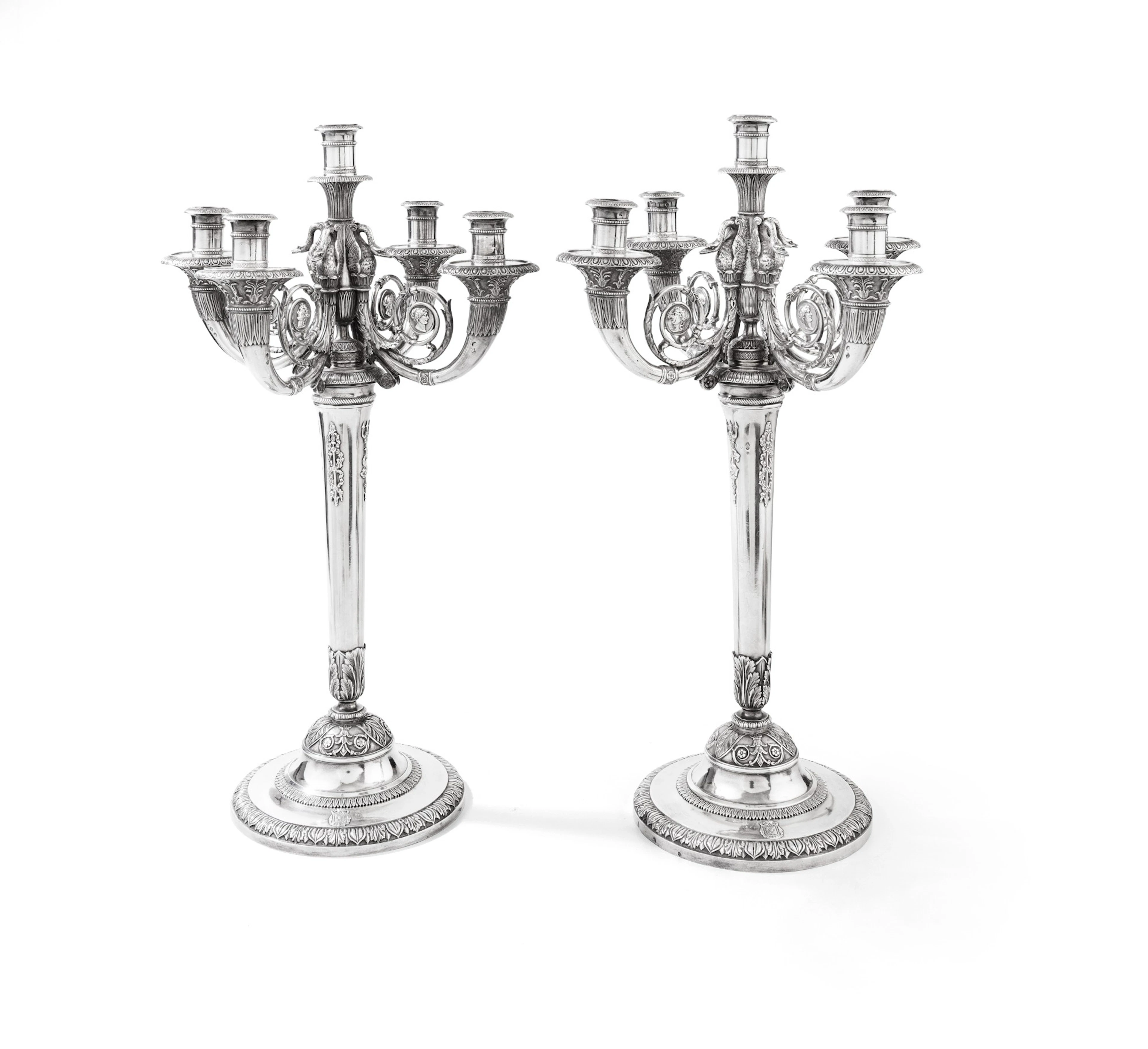 An important pair of French silver five-light candelabra...
