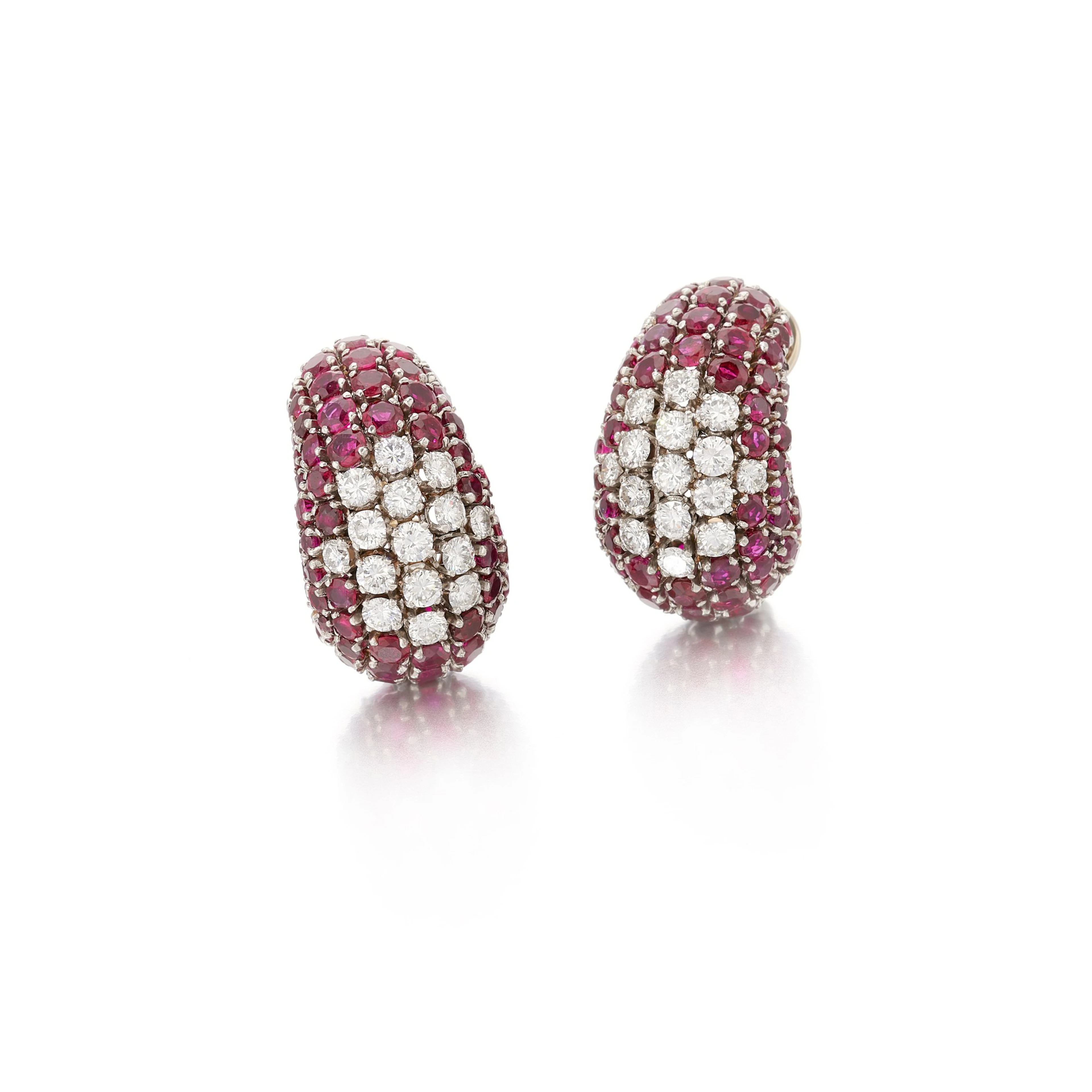 Pair of ruby and diamond earclips (Paio di orecchini a...