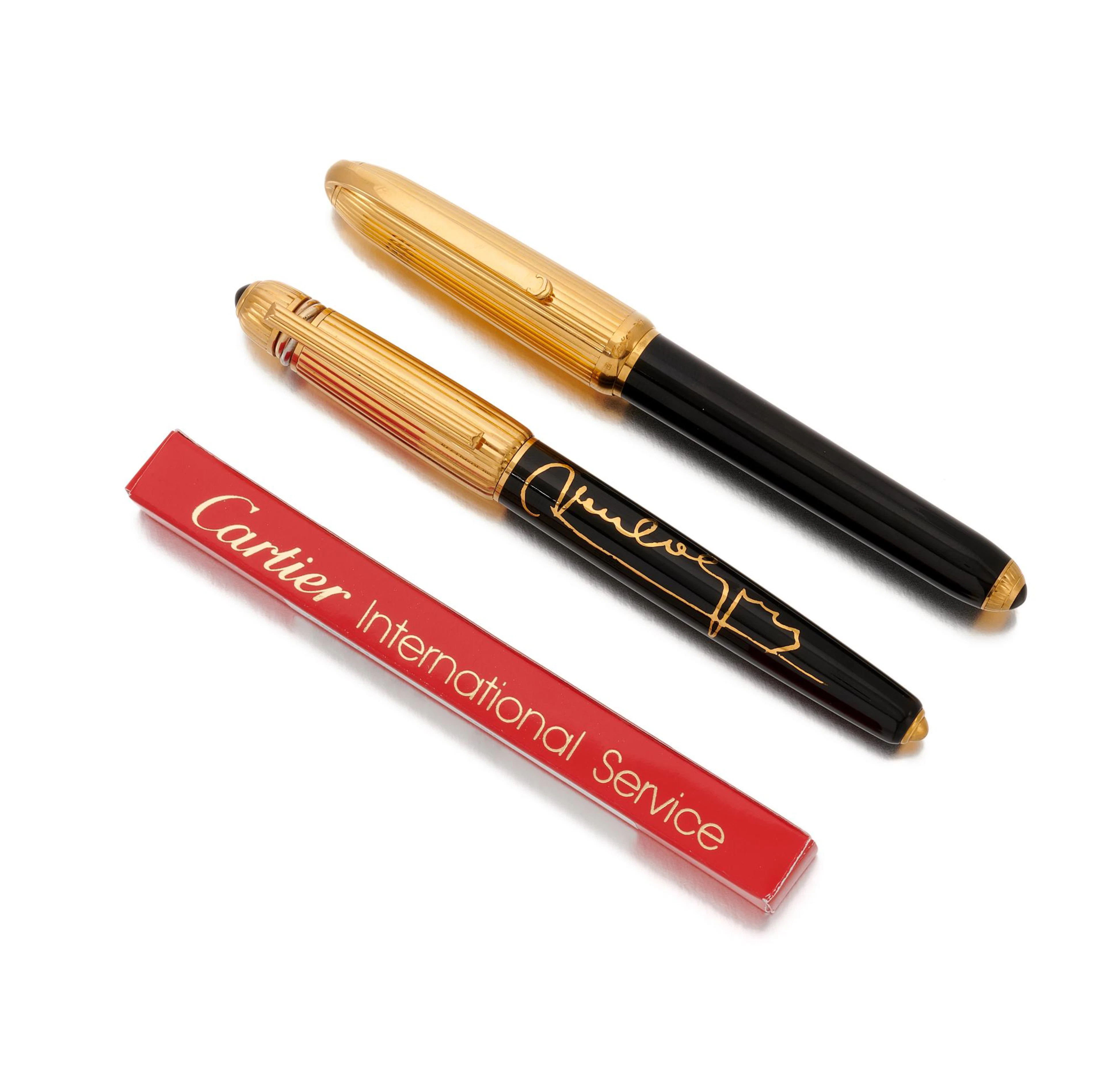 Two 'Pasha de Cartier' pens (Due penne 'Pasha' Cartier)