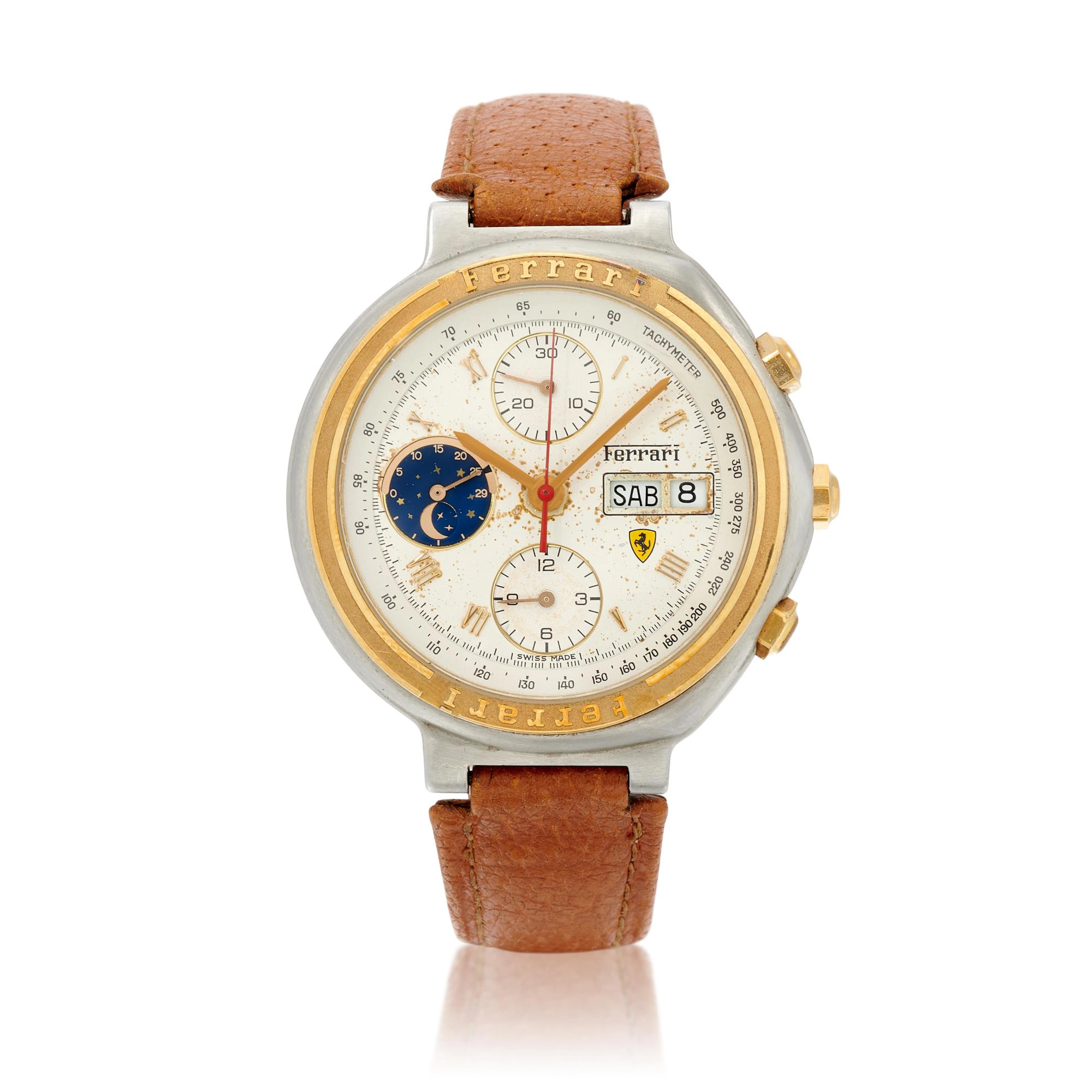 Stainless steel and yellow gold chronograph wristwatch with day