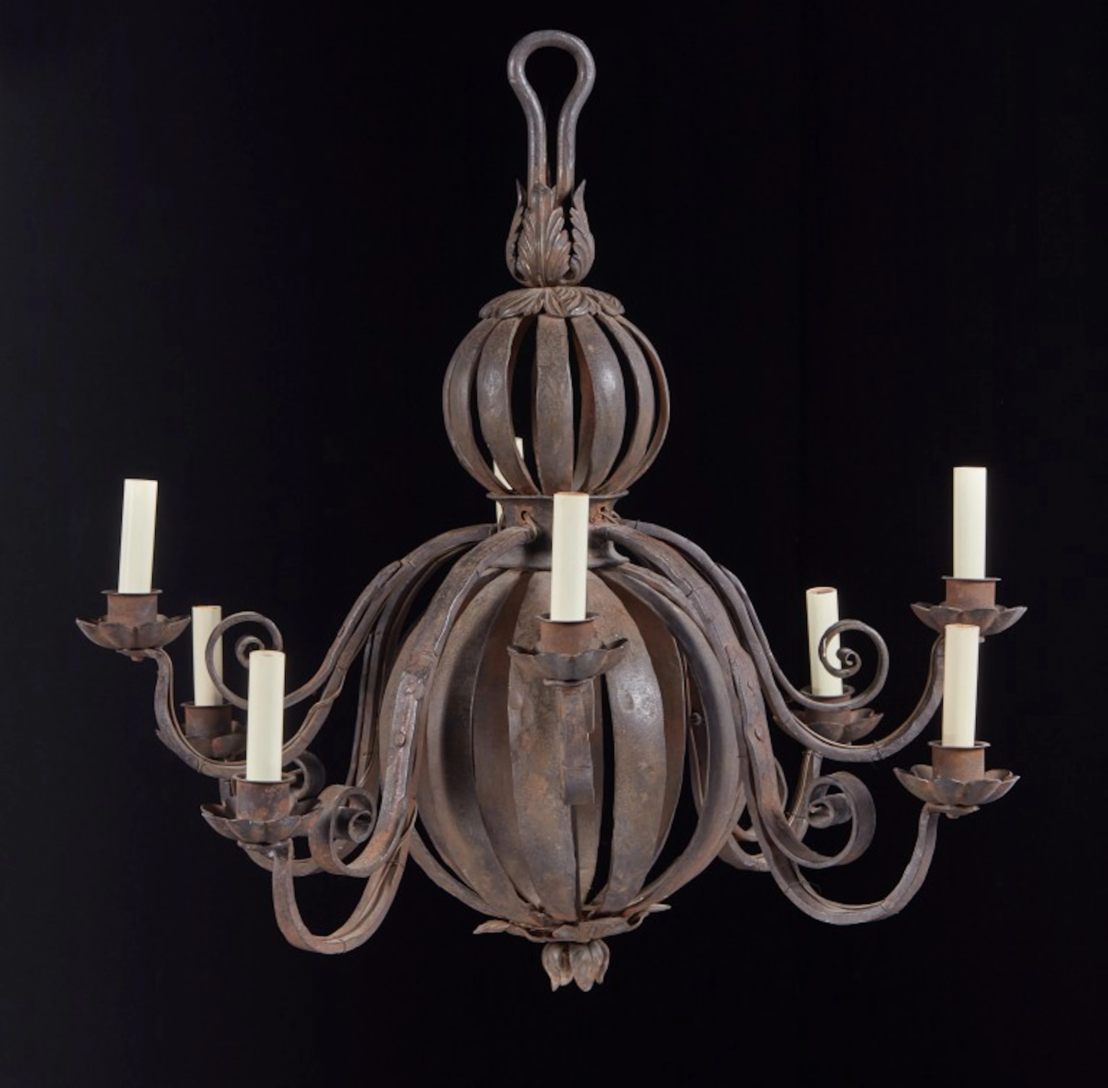 A Northern European Baroque Style Wrought Iron Eight-Light Chandelier