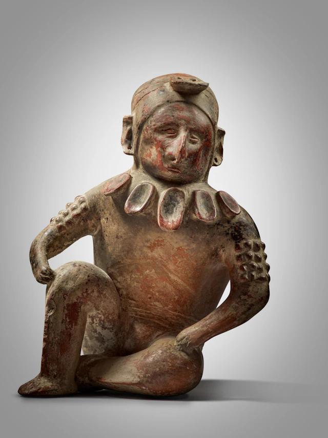 Colima Seated Hunchback Figure