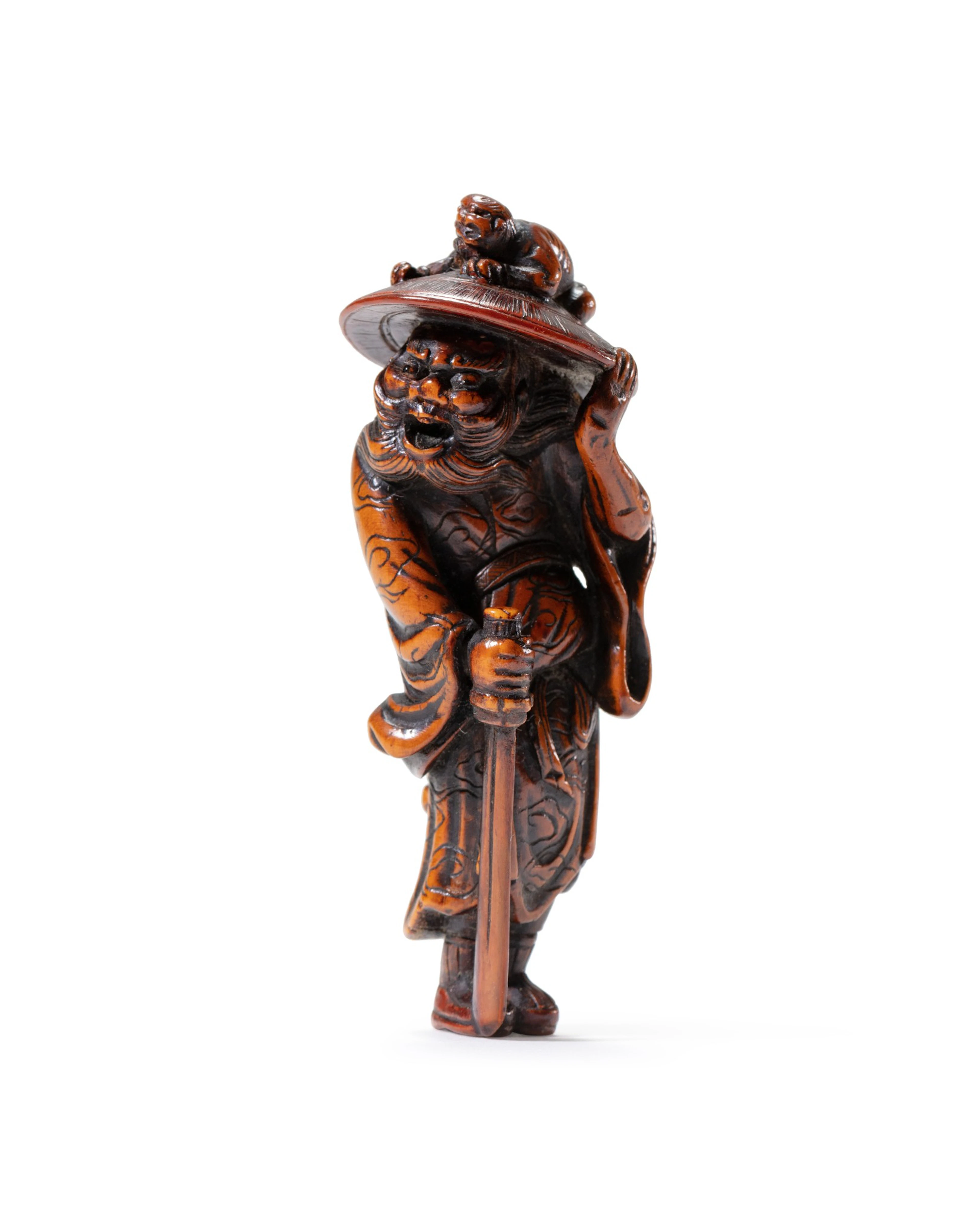 A carved wood study of Shoki and Oni Japan, Edo period | 日本 江戶時代 木雕鍾馗根付